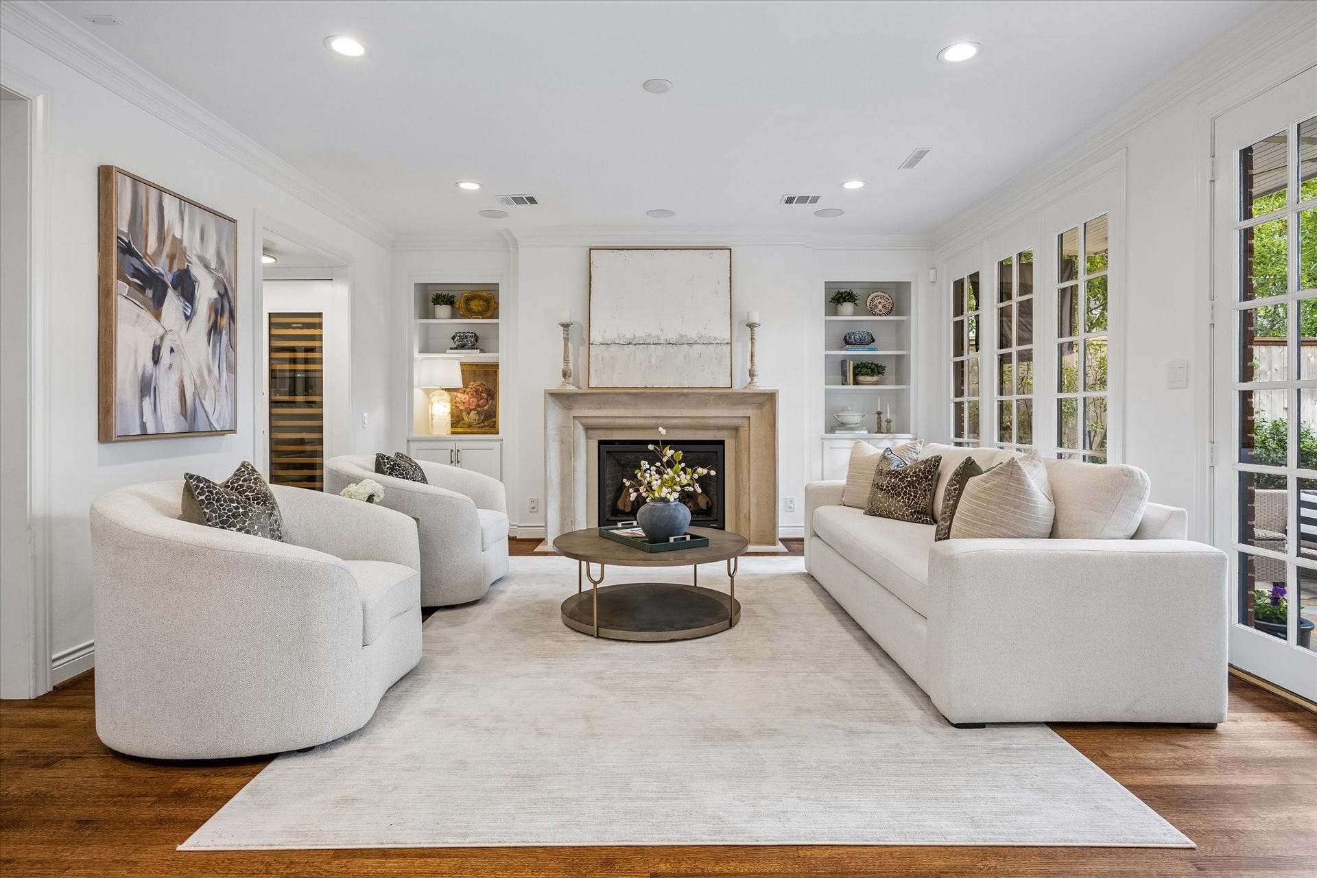 3111 Carnegie Street, Houston, TX 77005 This gorgeous Den is beautifully appointed with a recent stone fireplace, custom built-ins and windows overlooking the patio & garden.