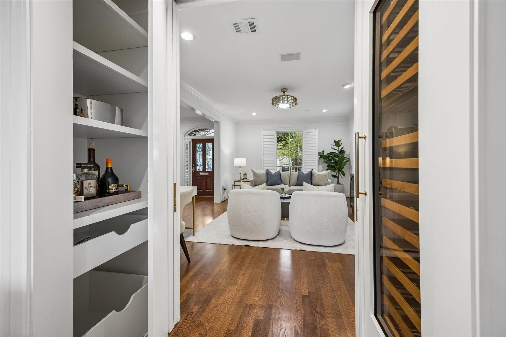 3111 Carnegie Street, Houston, TX 77005 The owners added thoughtful wine storage and "hidden" dry bar in this space off the Living Room and Den.