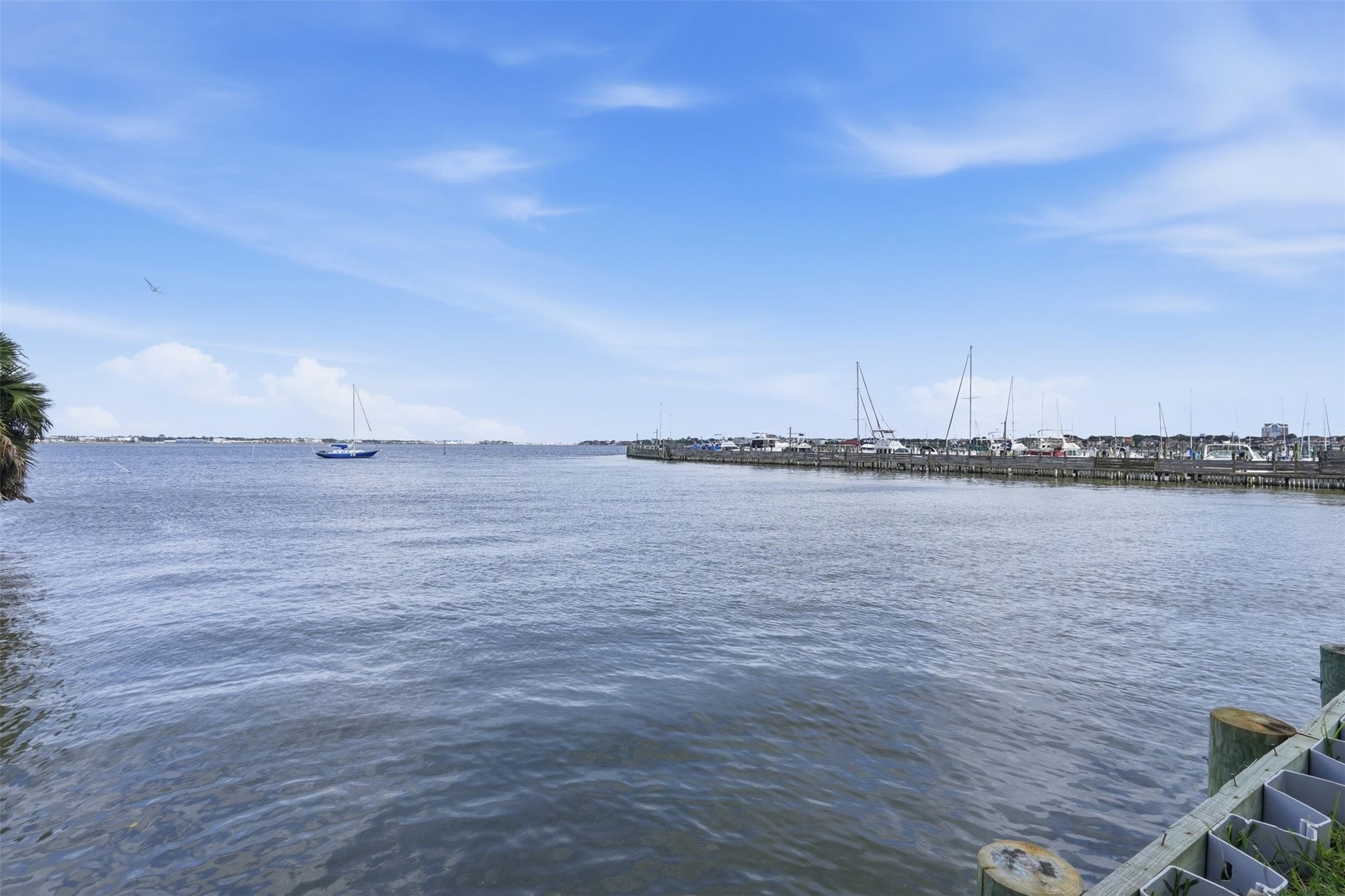 18024 Starboard Drive, Houston, TX 77058 Scenic water views with calm surroundings and distant sailboats, adding to the peaceful setting of this desirable community.