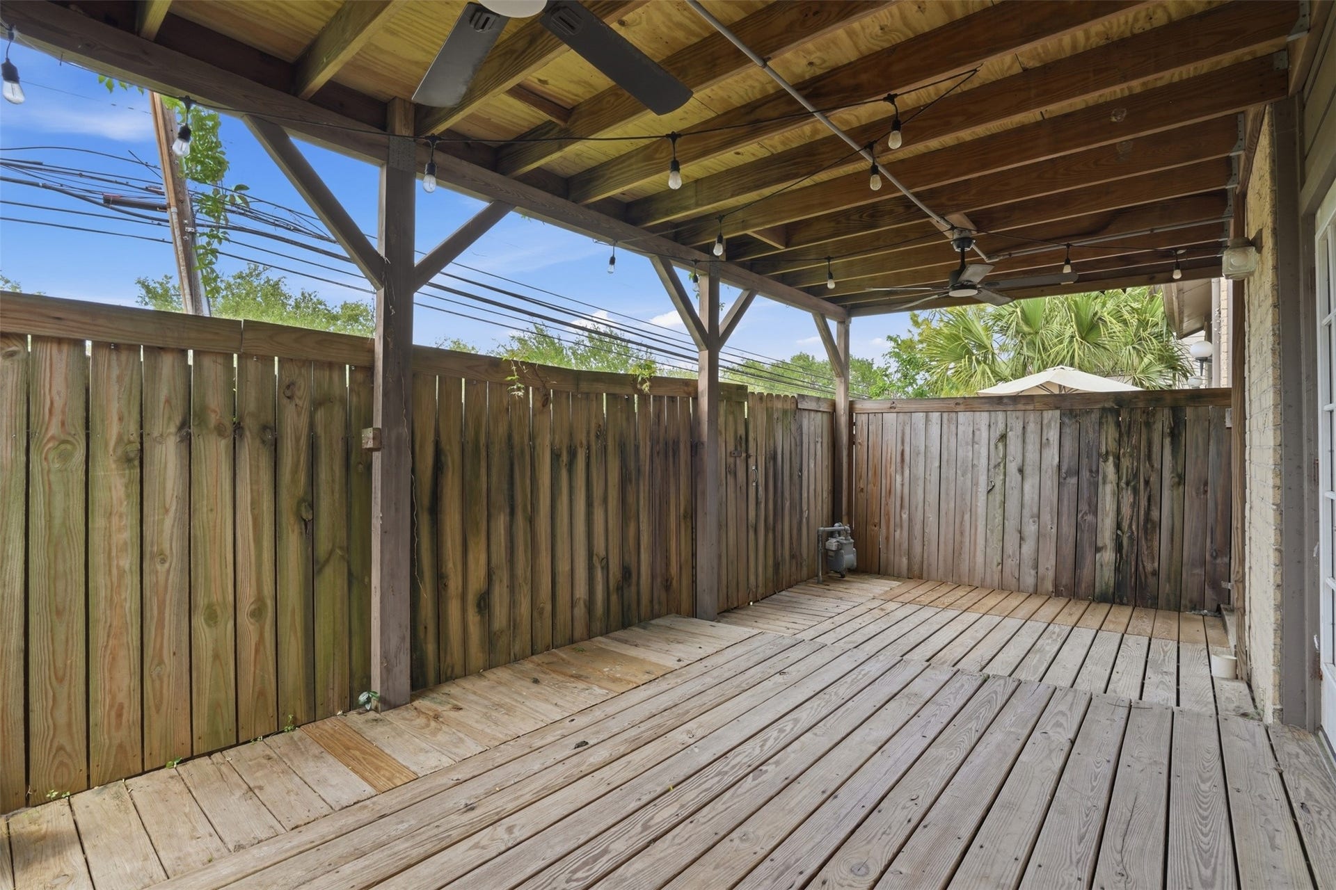 18024 Starboard Drive, Houston, TX 77058 Covered private deck located just off the living and dining areas, perfect for indoor outdoor living, relaxing, or entertaining guests.