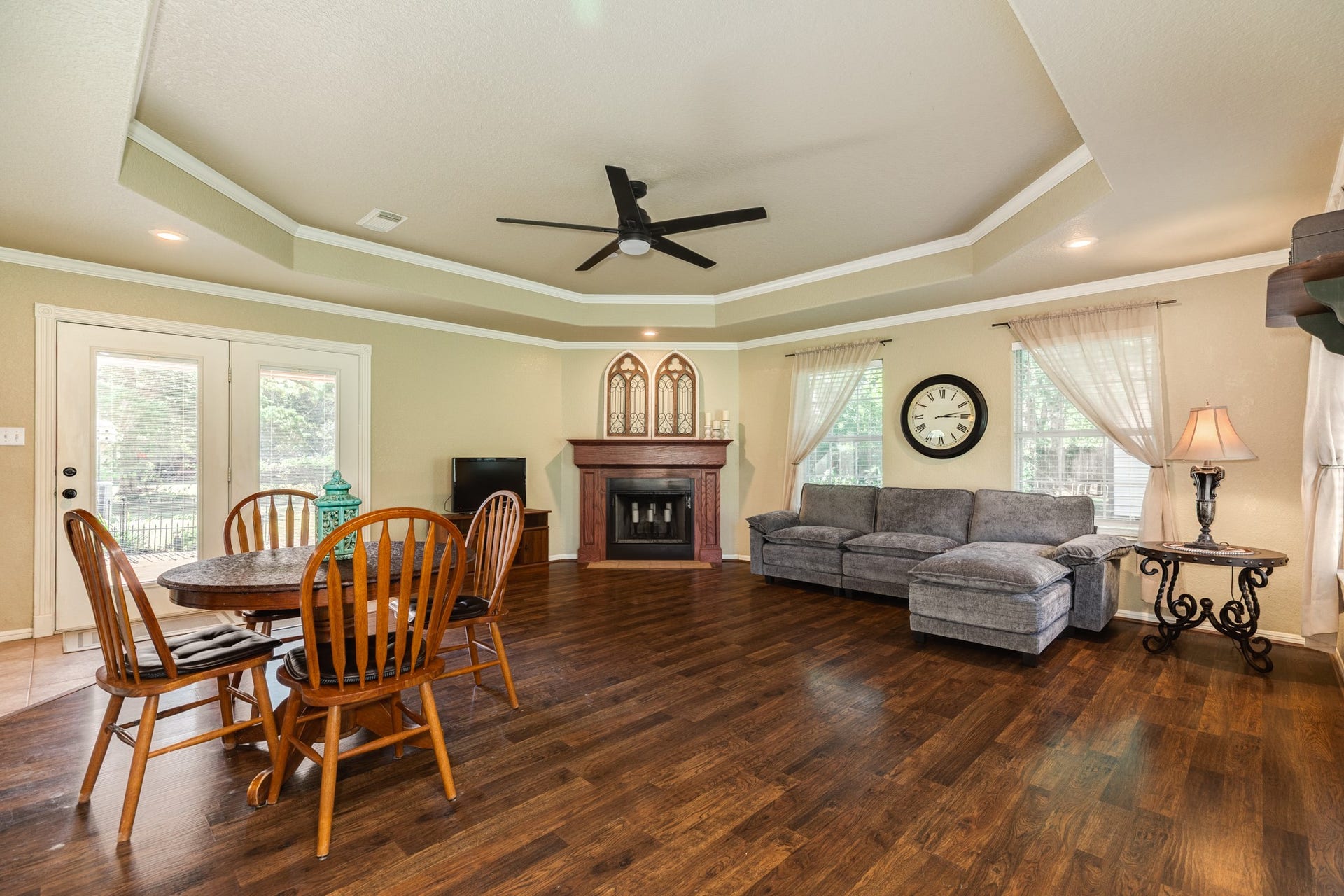 707 Old Ocean Avenue, Sweeny, TX 77480 Large living room with tray ceiling and wood burning fireplace