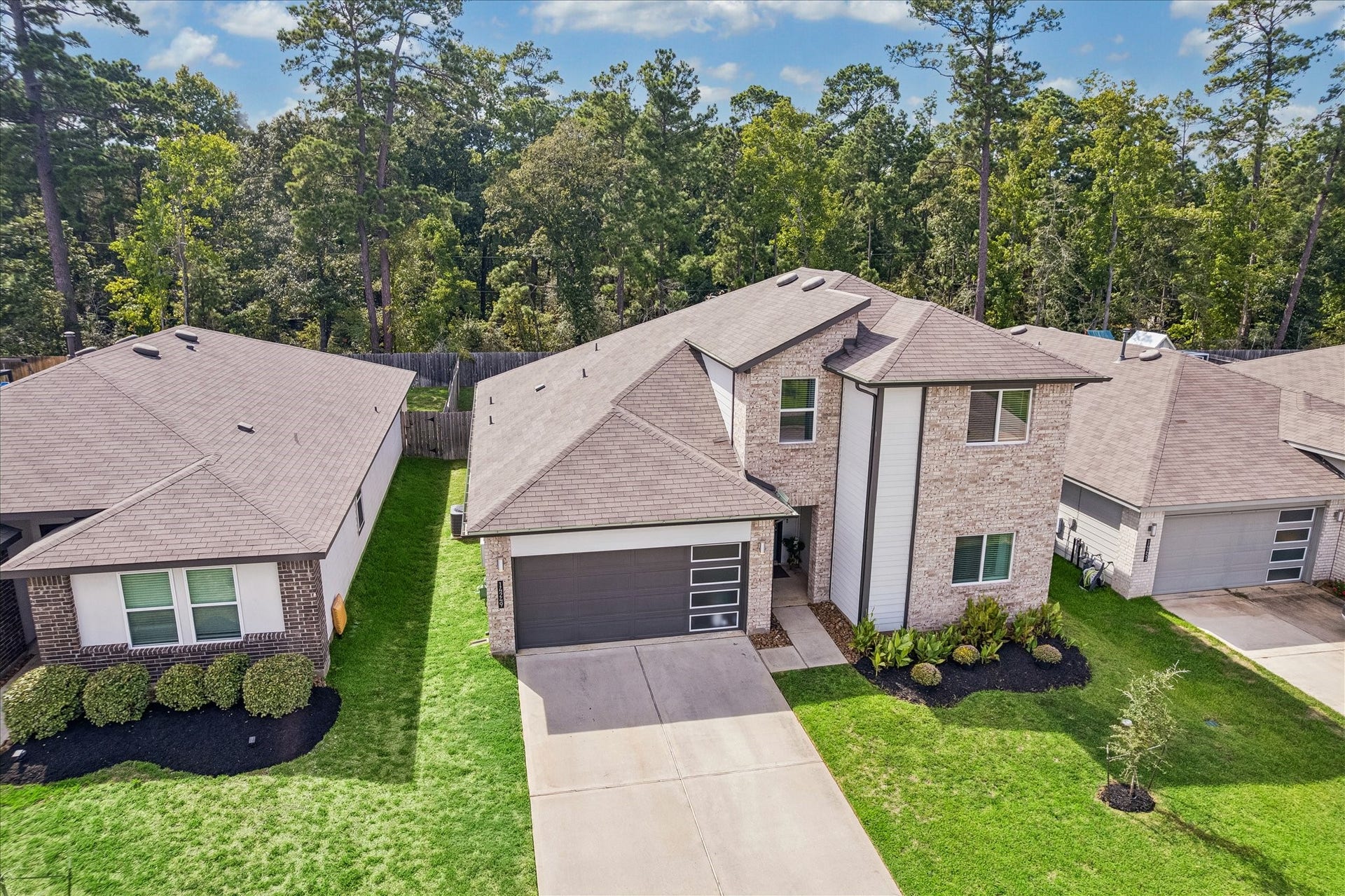 14249 Wonder Lake Lane, Conroe, TX 77384 This home backs to a wall of trees! Completely private backyard.