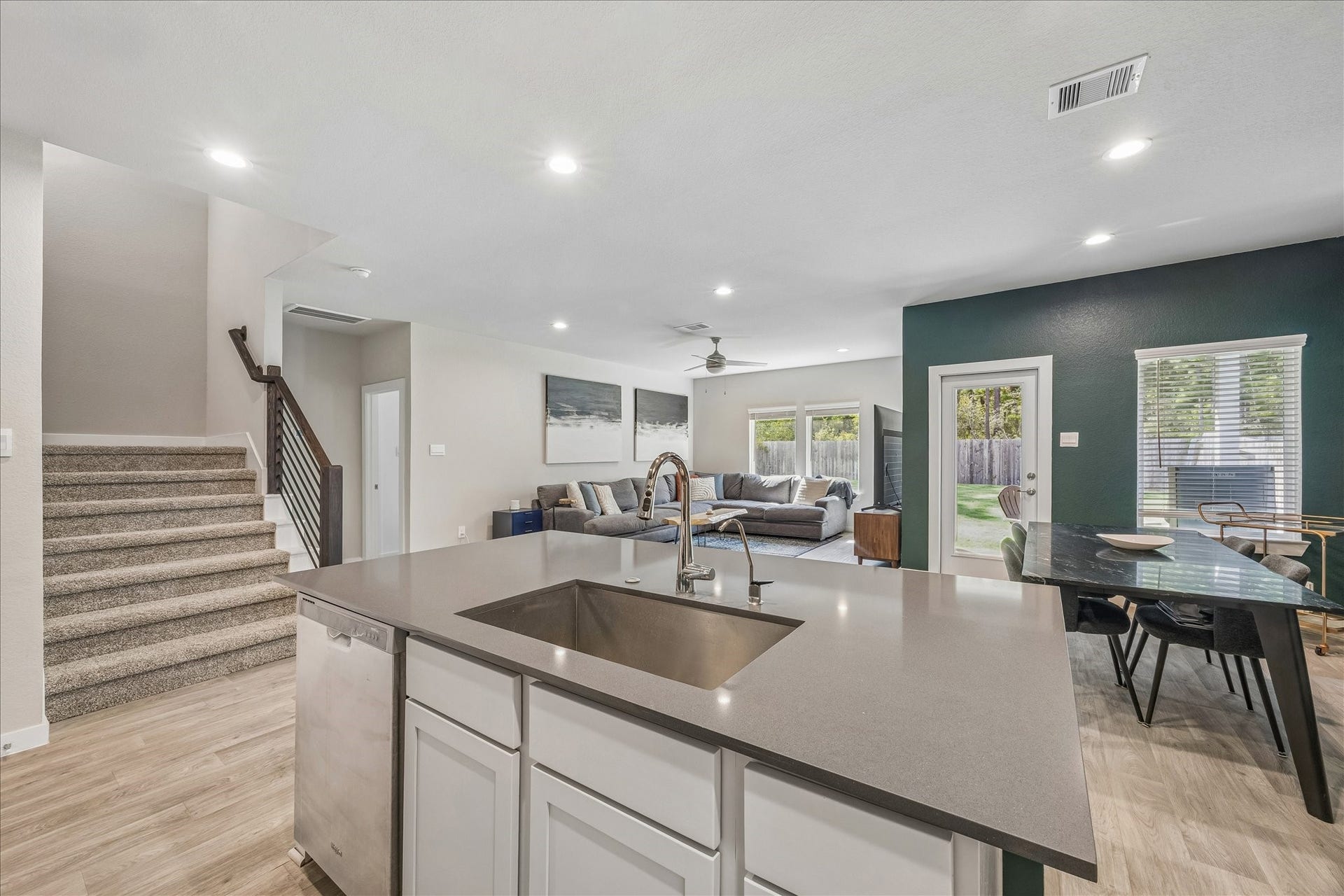 14249 Wonder Lake Lane, Conroe, TX 77384 The hub of the home. This home offers an ease of movement throughout.