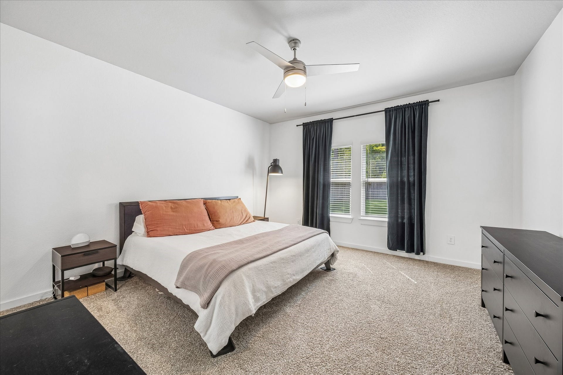 14249 Wonder Lake Lane, Conroe, TX 77384 The primary bedroom is spacious and bright. You will love waking up to views of nature.