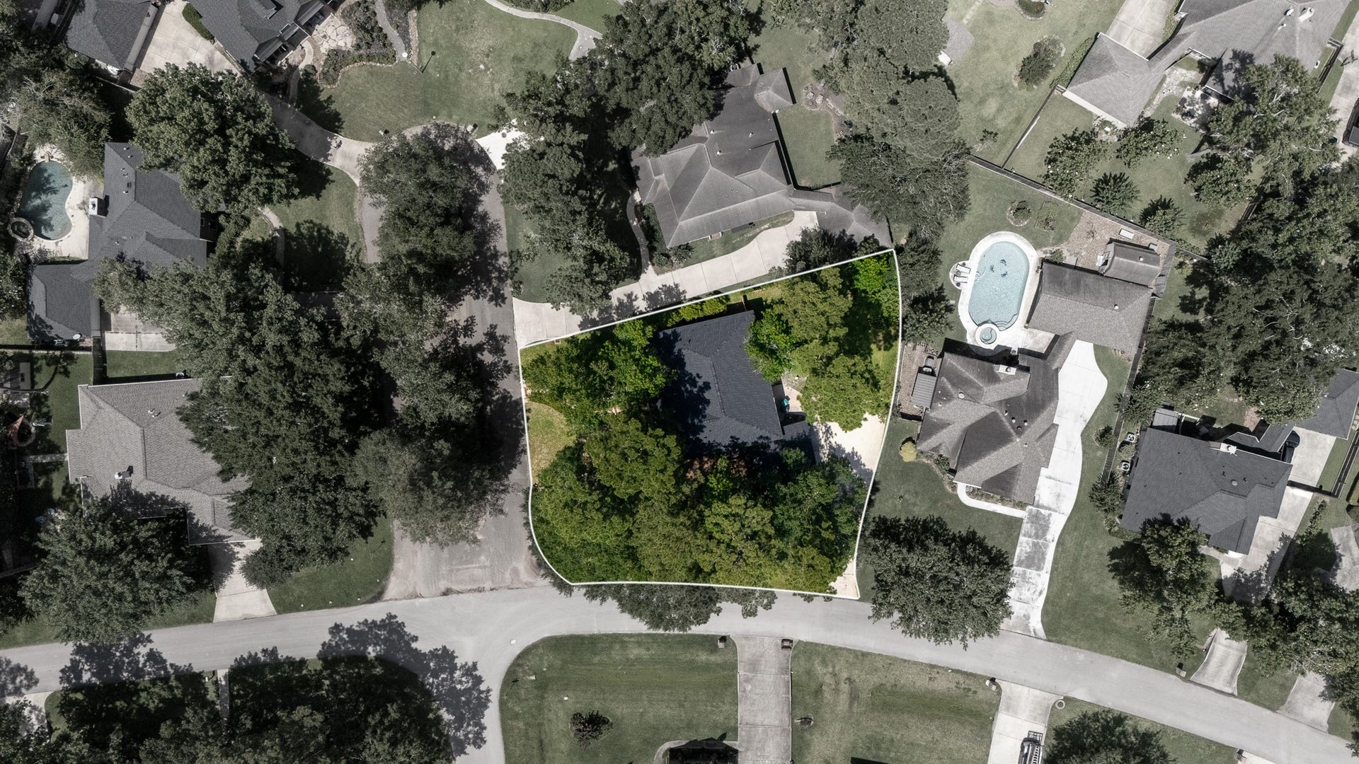 523 Rampart Lane, Conroe, TX 77302 Nestled in a serene neighborhood, this property boasts ample tree coverage for privacy and a spacious lot perfect for outdoor living.