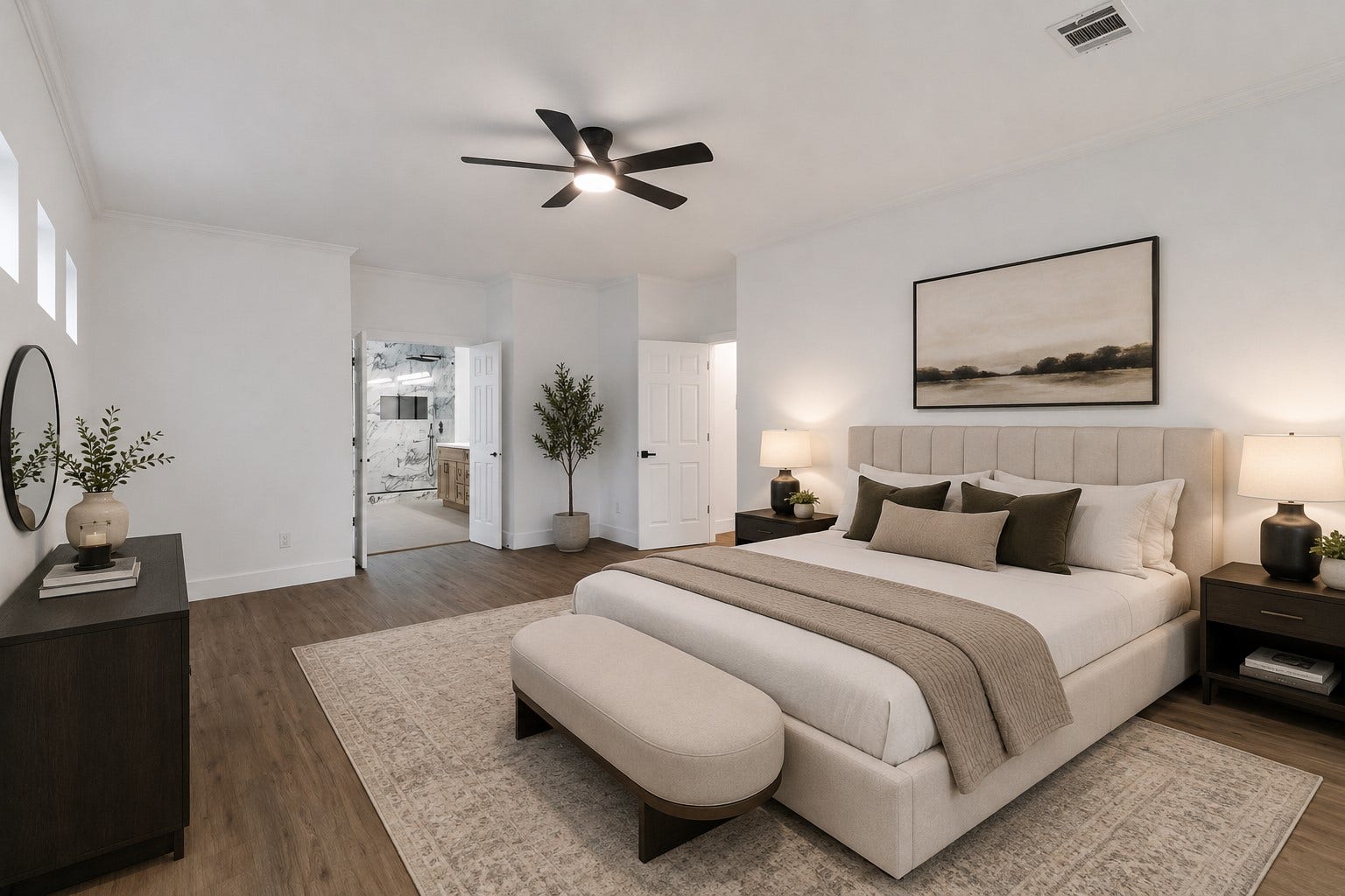523 Rampart Lane, Conroe, TX 77302 Spacious and elegant bedroom featuring a cozy bed, modern ceiling fan. Natural light streams through high windows, and an en-suite bath offers added luxury. Photo digitally staged.