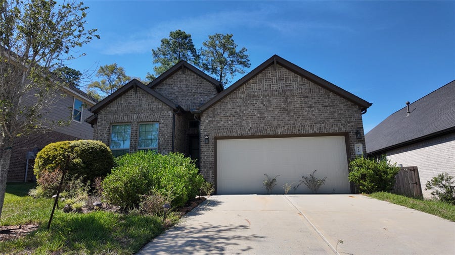 Property photo for 619 Spotted Sunfish Drive, Conroe, TX