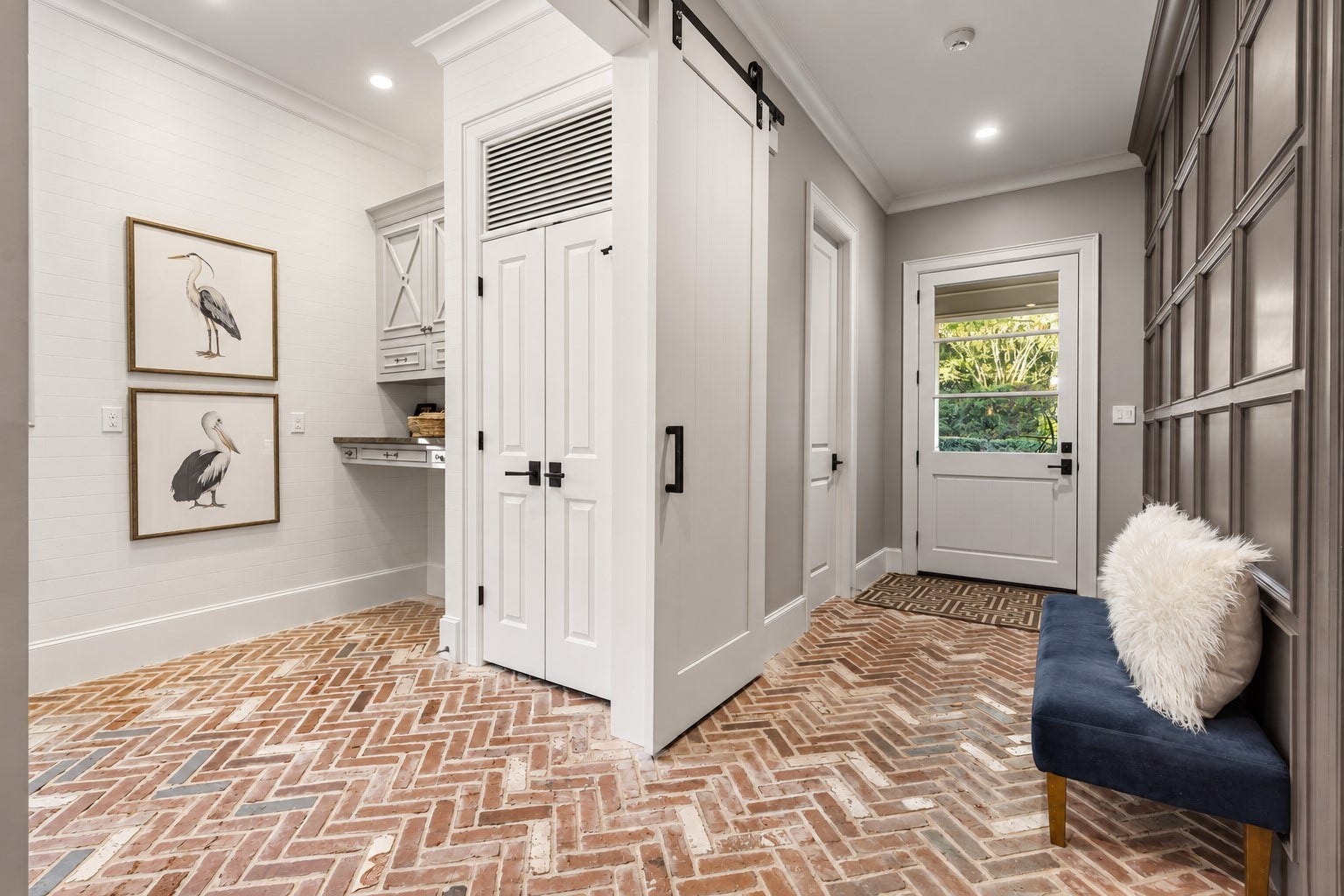 14 Peony Springs Court, The Woodlands, TX 77382 Mud area with herringbone brick lined floor and plenty of additional storage for keeping the family organized.