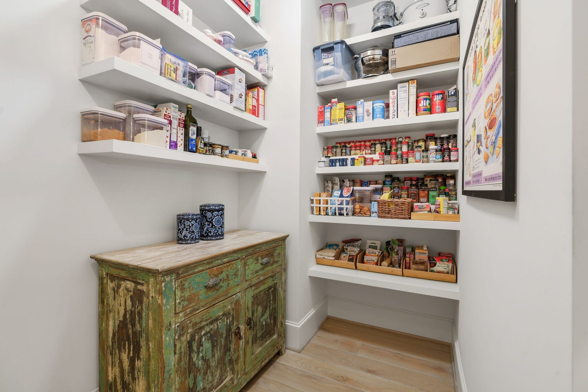 14 Peony Springs Court, The Woodlands, TX 77382 Includes a generous cabinet with pullouts for small appliances and a Calacatta marble counter (not shown).