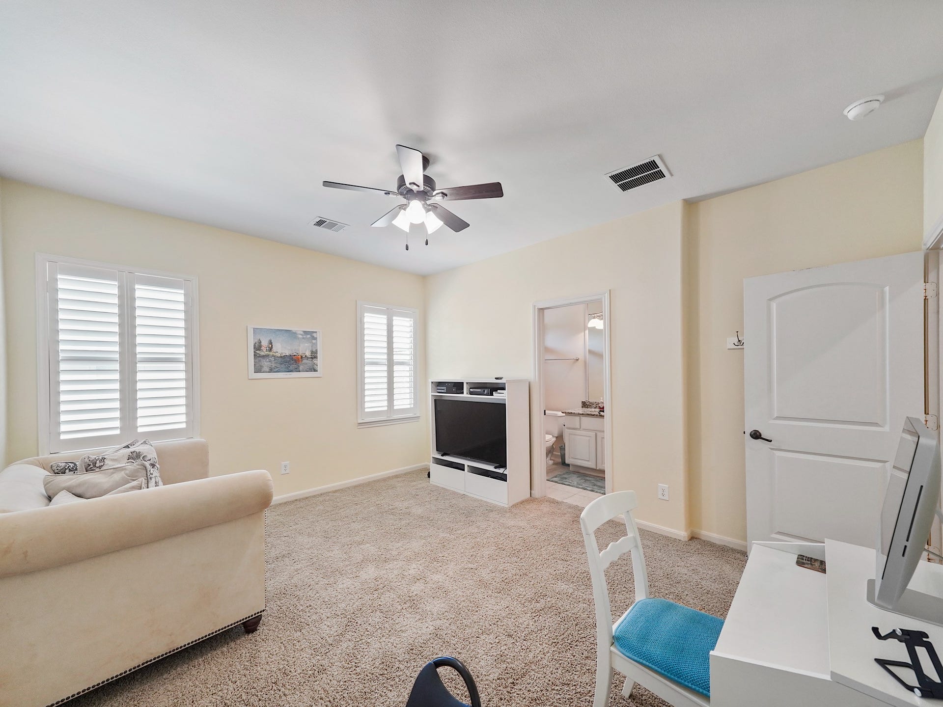 5907 Hawthorne Garden Way, Katy, TX 77494 A second view highlights the rooms comfortable scale and easy potential to become a personalized retreat.