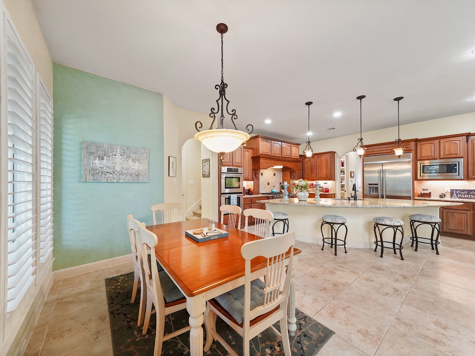 5907 Hawthorne Garden Way, Katy, TX 77494 The breakfast area brings a relaxed, light-filled place for casual meals, morning coffee, or lingering conversations at the start of the day.