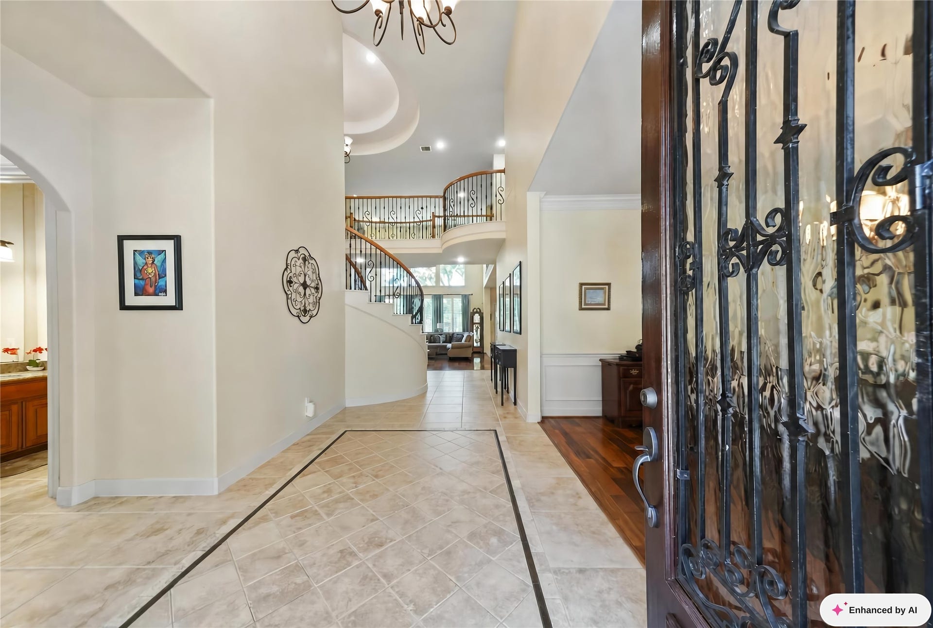 5907 Hawthorne Garden Way, Katy, TX 77494 Inside, the two-story foyer creates an elegant arrival with open sightlines, detailed millwork, and a natural flow toward the homes formal and everyday spaces.