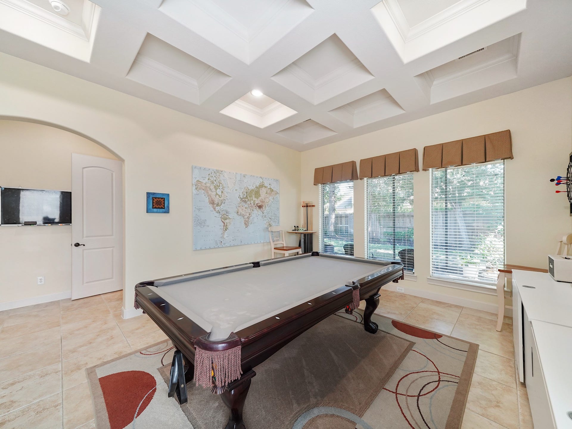 5907 Hawthorne Garden Way, Katy, TX 77494 A downstairs game room adds another inviting place to gather, with room for game nights, conversation, and entertaining.
