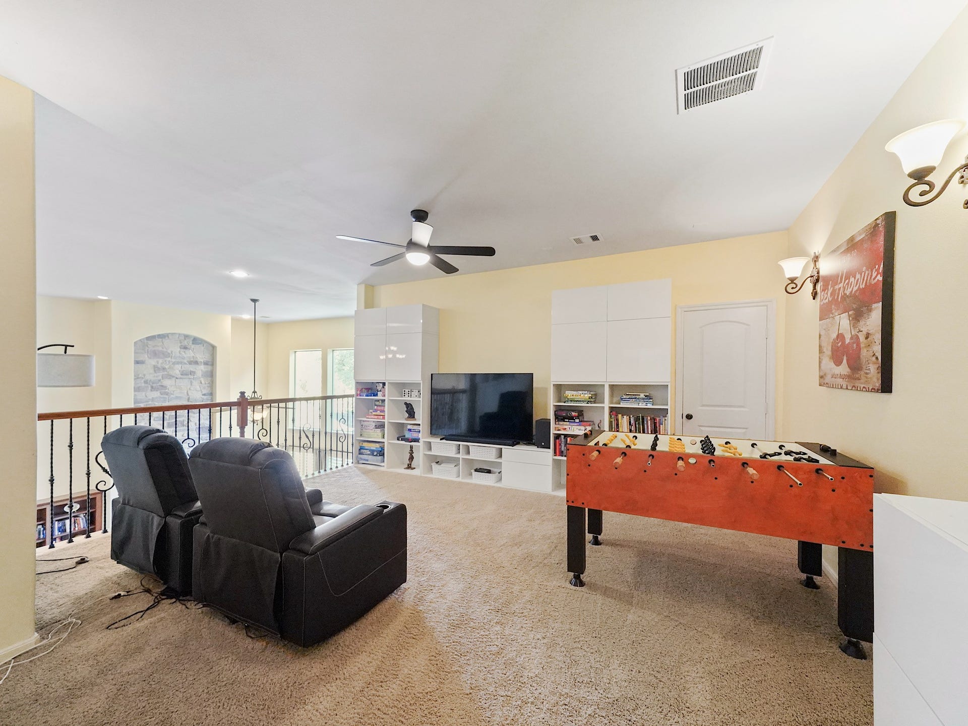 5907 Hawthorne Garden Way, Katy, TX 77494 Upstairs, the loft-style game room gives everyone room to spread out for movie nights, games, and relaxed weekends at home.
