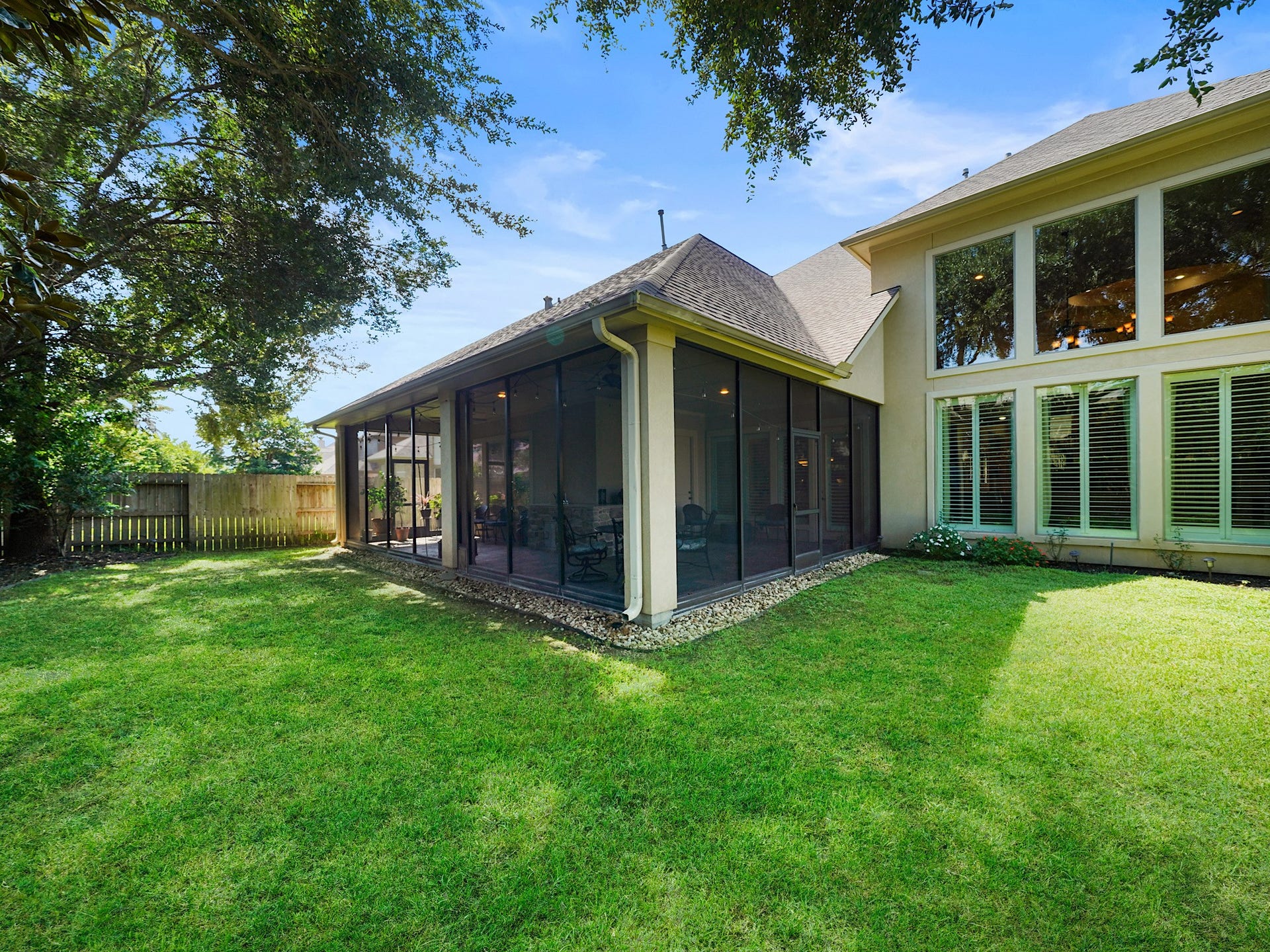 5907 Hawthorne Garden Way, Katy, TX 77494 A broad backyard lawn offers room to play, garden, or create the outdoor setup that fits your lifestyle.