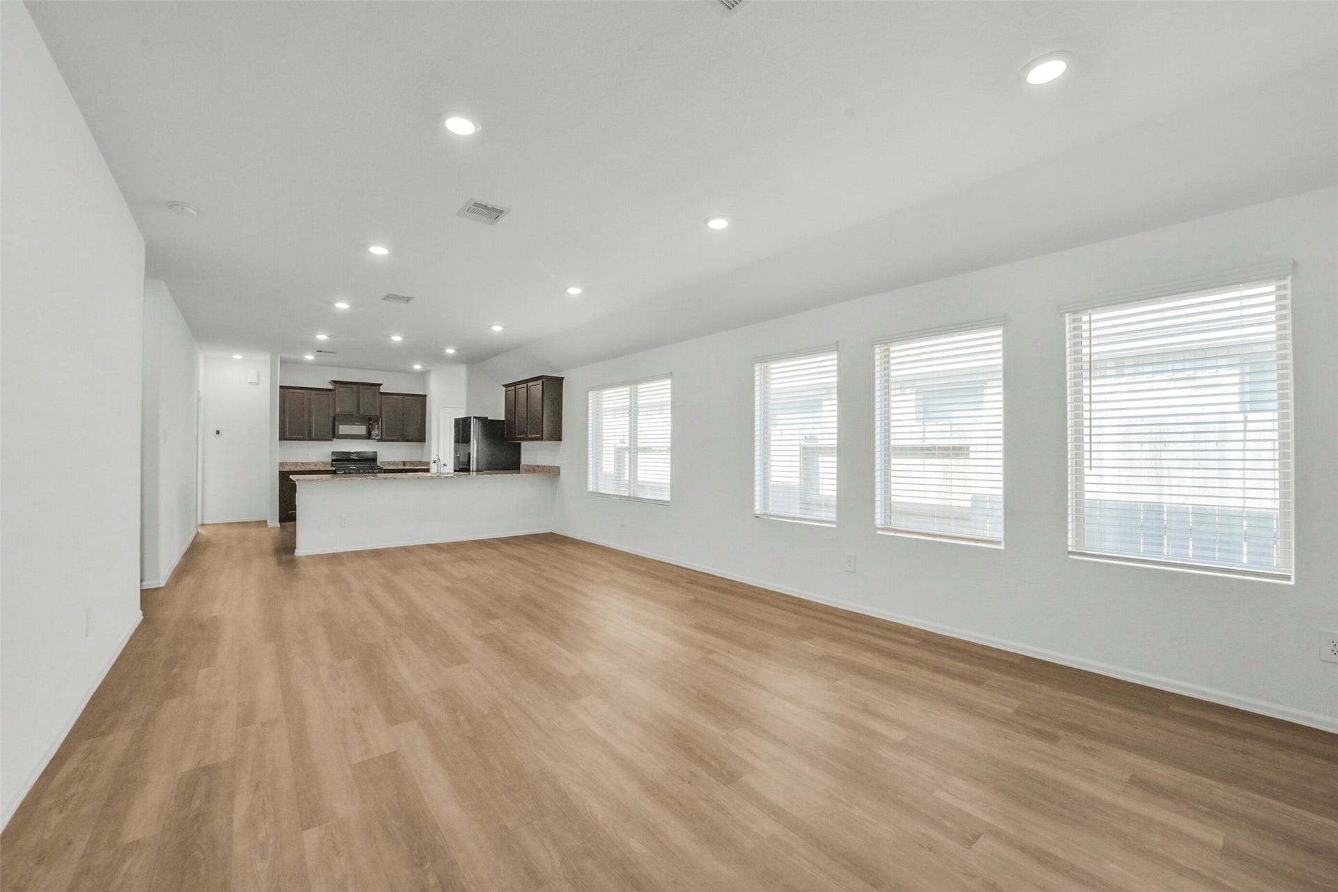 18511 Summit Ranch Drive, Hockley, TX 77447 Spacious living area beautifully well lit with a cascade of natural light.
