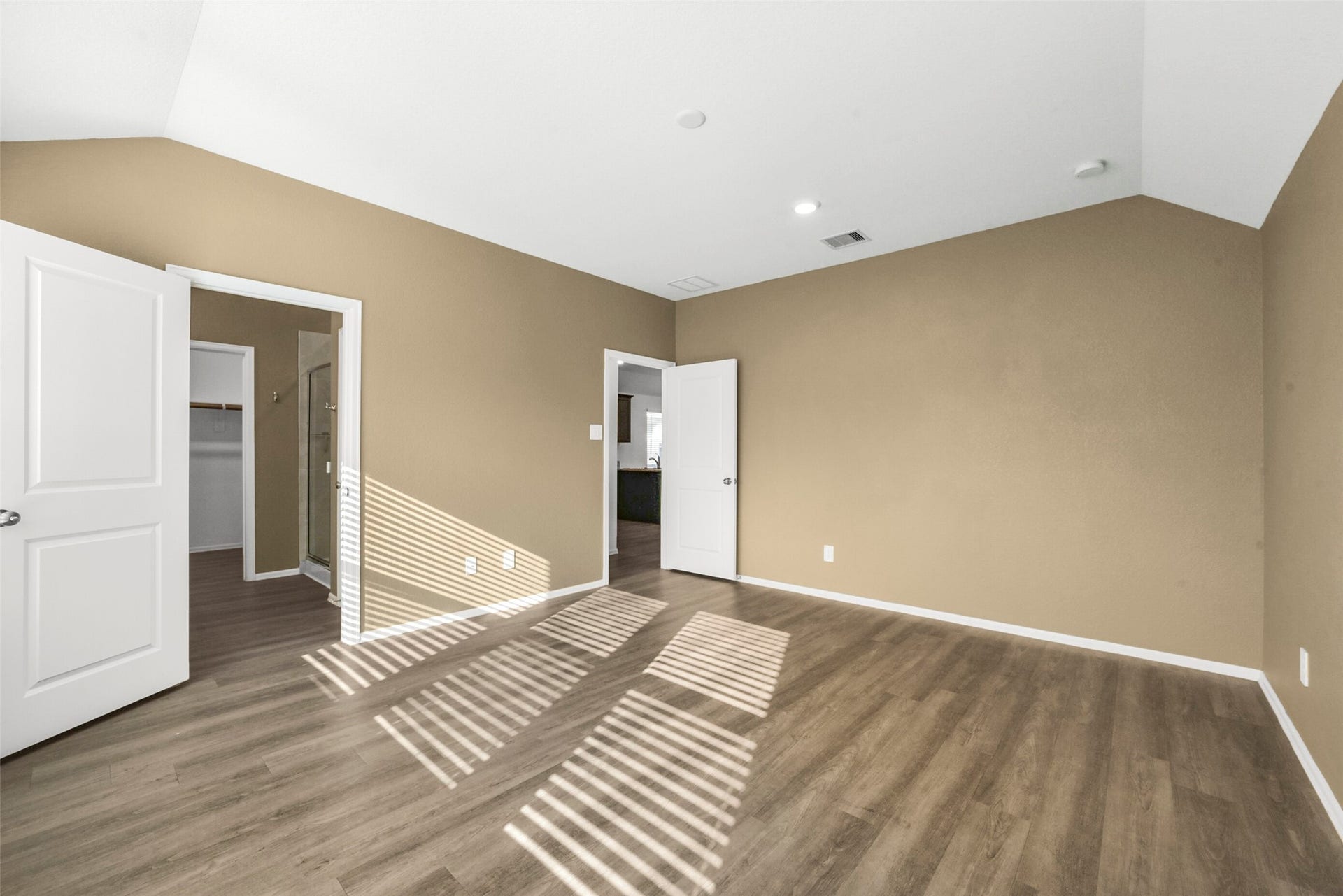 18511 Summit Ranch Drive, Hockley, TX 77447 Another view of the primary bedroom with en suite bath entrance on the left