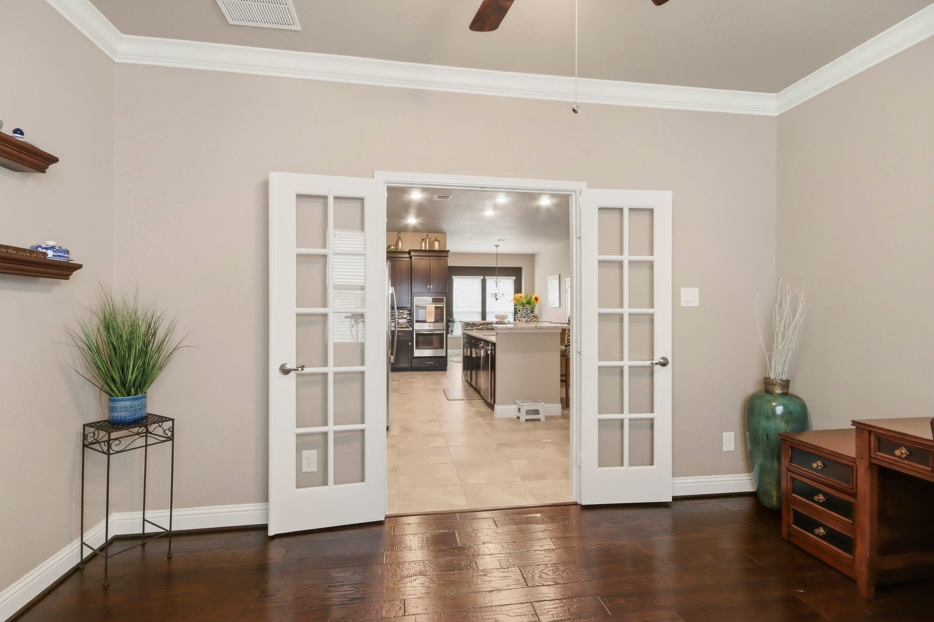 11 Whispering Thicket Place, The Woodlands, TX 77375 French doors open to the home office/study.