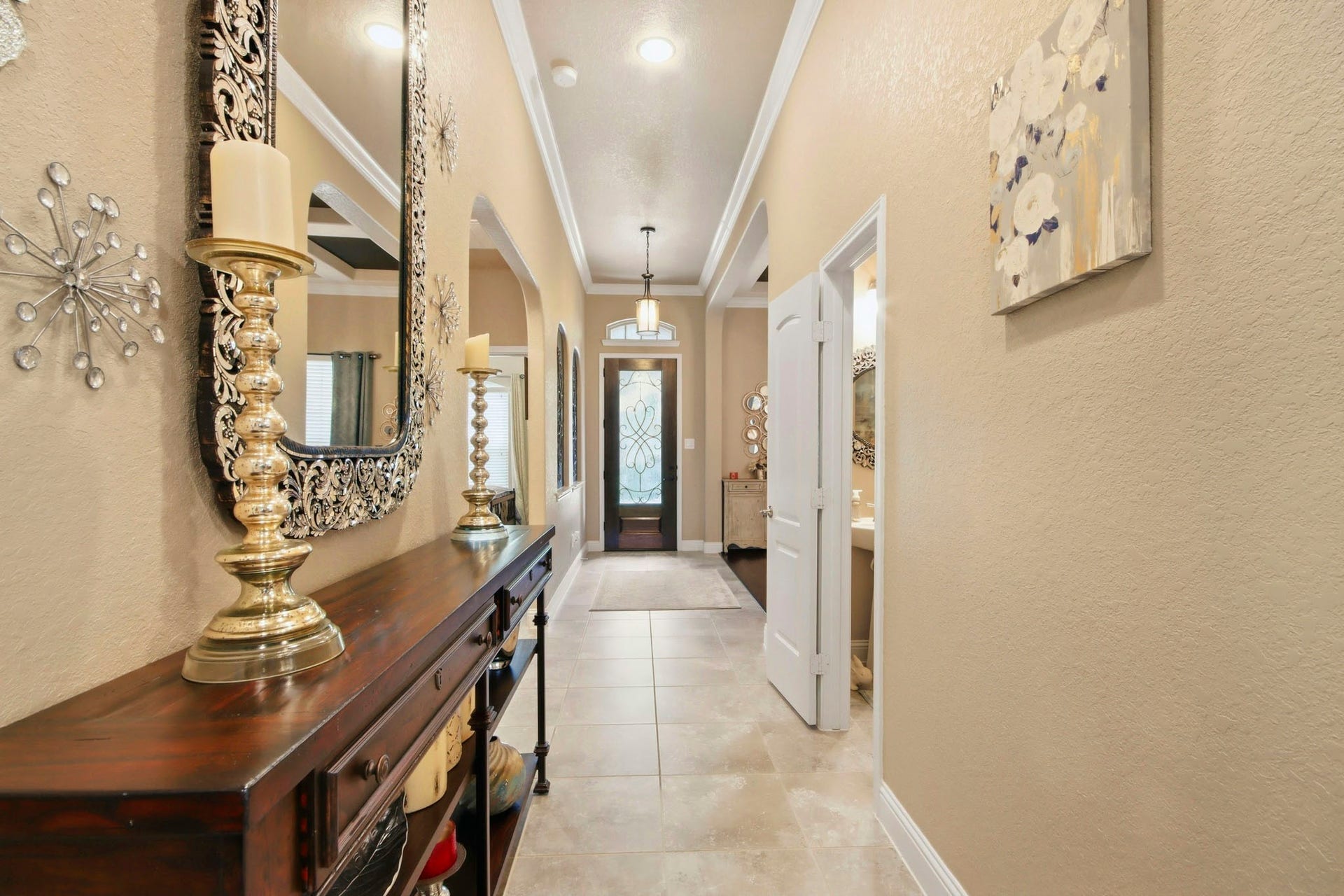 11 Whispering Thicket Place, The Woodlands, TX 77375 Entryway leading to a bright and inviting space.
