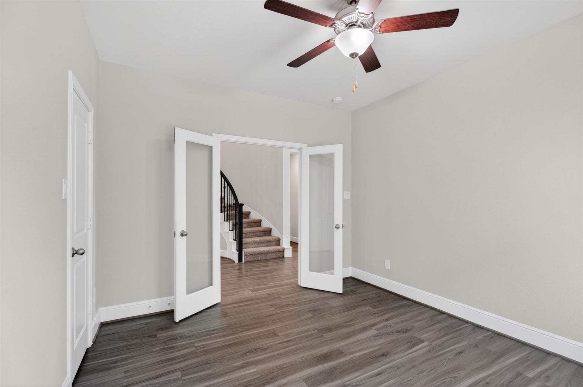 3123 Lantana Trail, Katy, TX 77493 Tucked just off the entry, the private home office provides a quiet and refined space for work, study, or creative pursuits. Elegant glass French doors create a sophisticated focal point while allowing natural light to flow throughout the room.