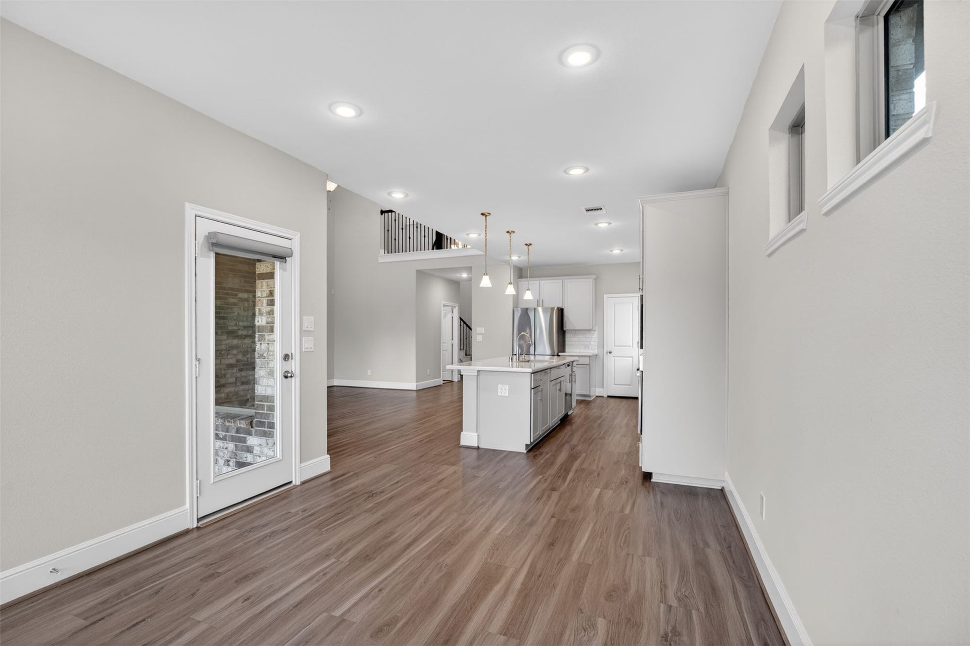 3123 Lantana Trail, Katy, TX 77493 This perspective highlights the thoughtful connection between the dining room and kitchen.