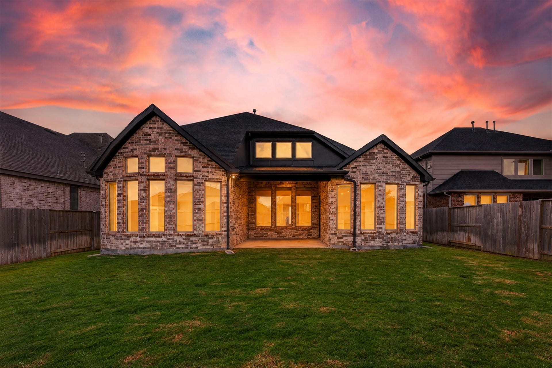 3123 Lantana Trail, Katy, TX 77493 As daylight fades, the home transforms into a warm and inviting retreat. The illuminated windows create a beautiful glow that highlights the home's architectural features. It's an ideal setting for enjoying peaceful evenings under the Texas sky.