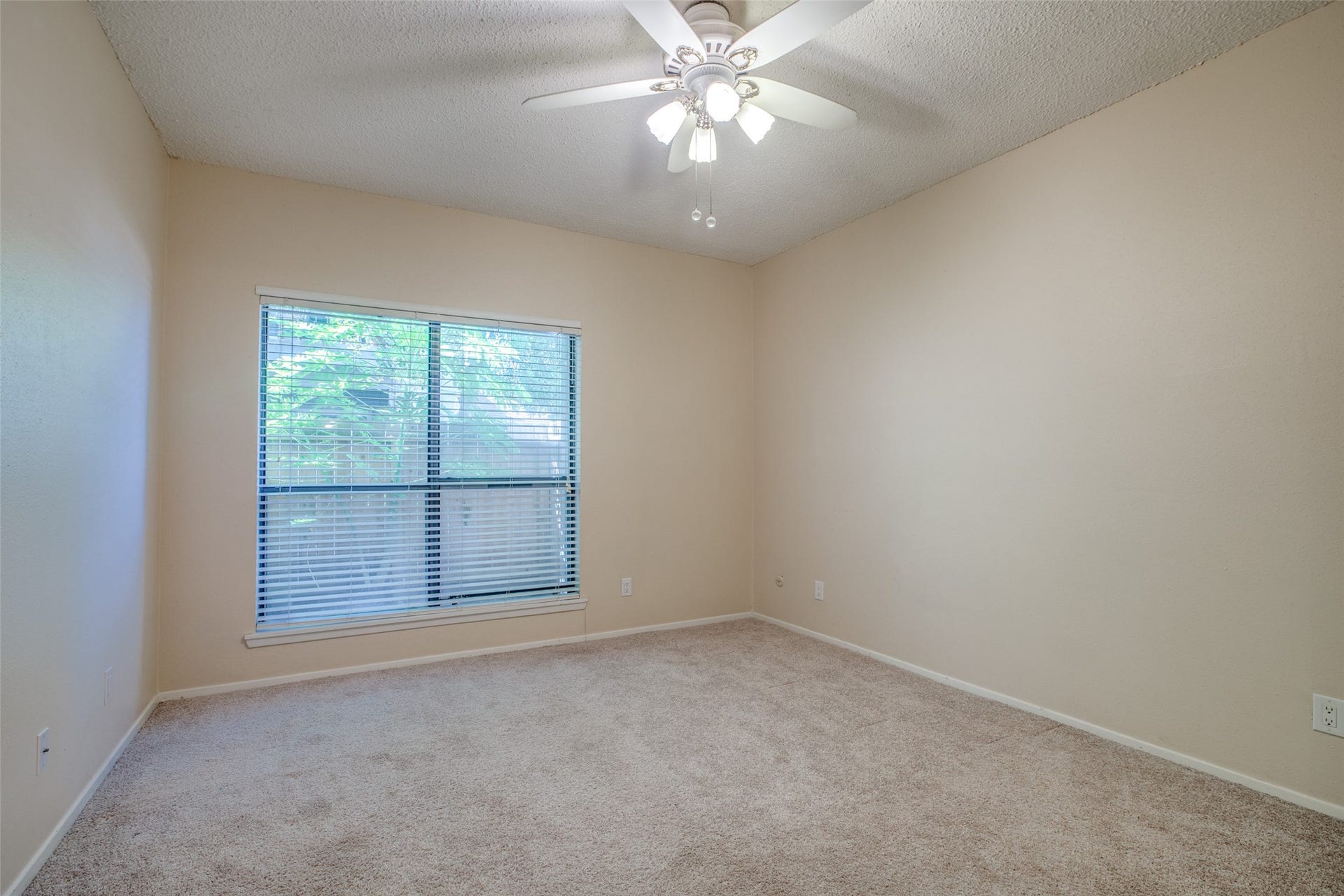 7900 N Stadium Drive, #93, Houston, TX 77030 Entering the spacious bedroom with large window out to private patio.
