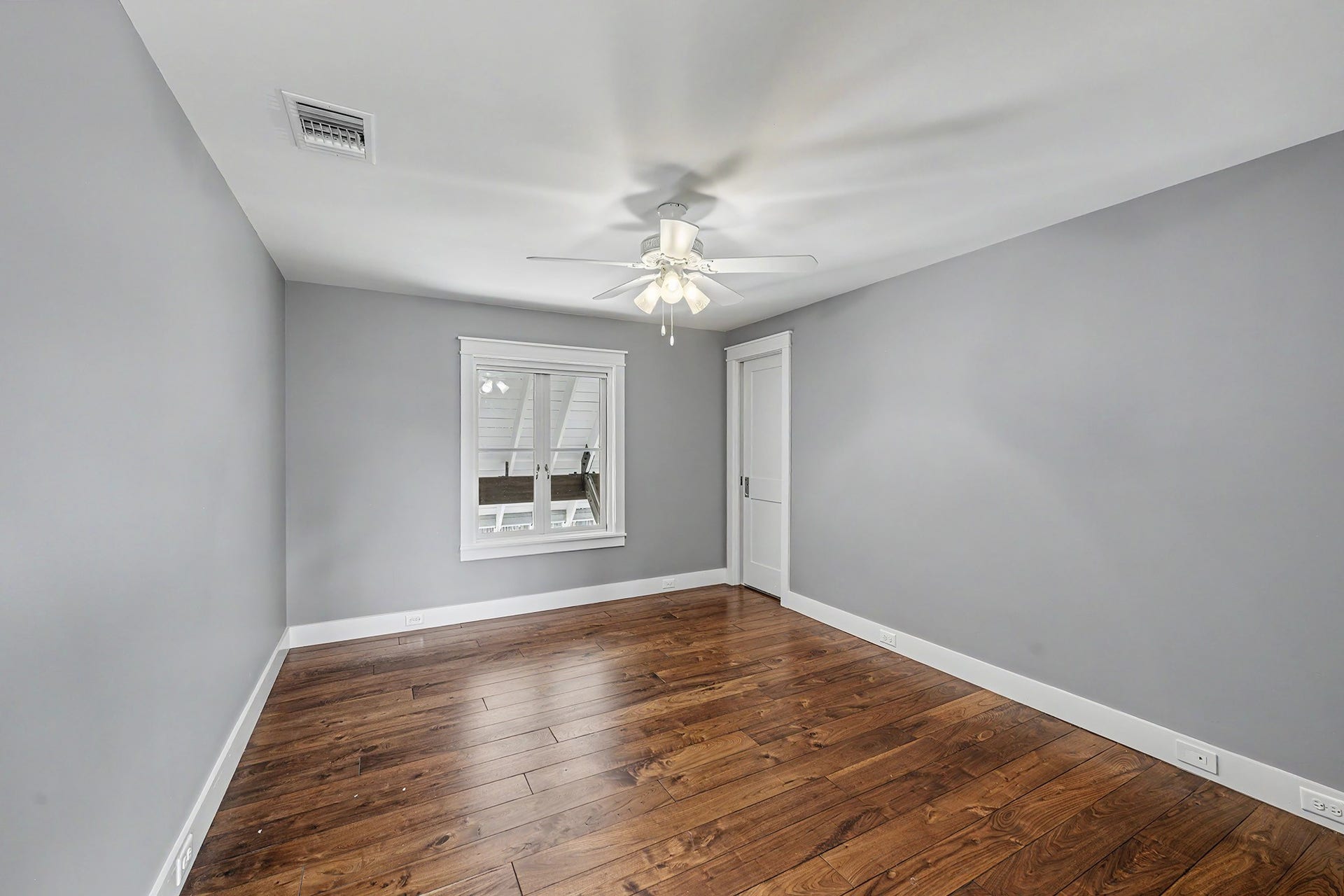 4153 Oberlin Street, West University Place, TX 77005 Secondary bedroom with wood floors.
