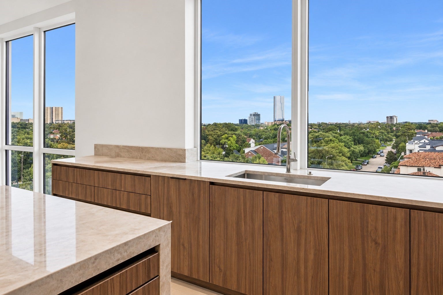 5010 Longmont Drive, #PH-6, Houston, TX 77056 Kitchen featuring Eggersmann brand cabinetry, Taj Mahal countertops, Thermador brand appliances.