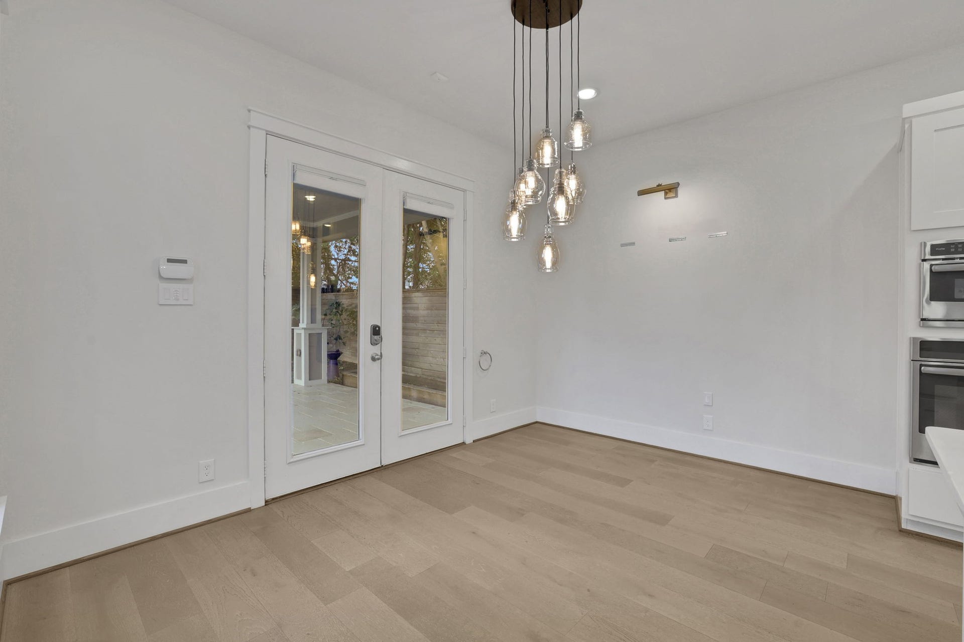 8558 Ridgepoint Drive, Houston, TX 77055 Generous floor space and a statement chandelier.