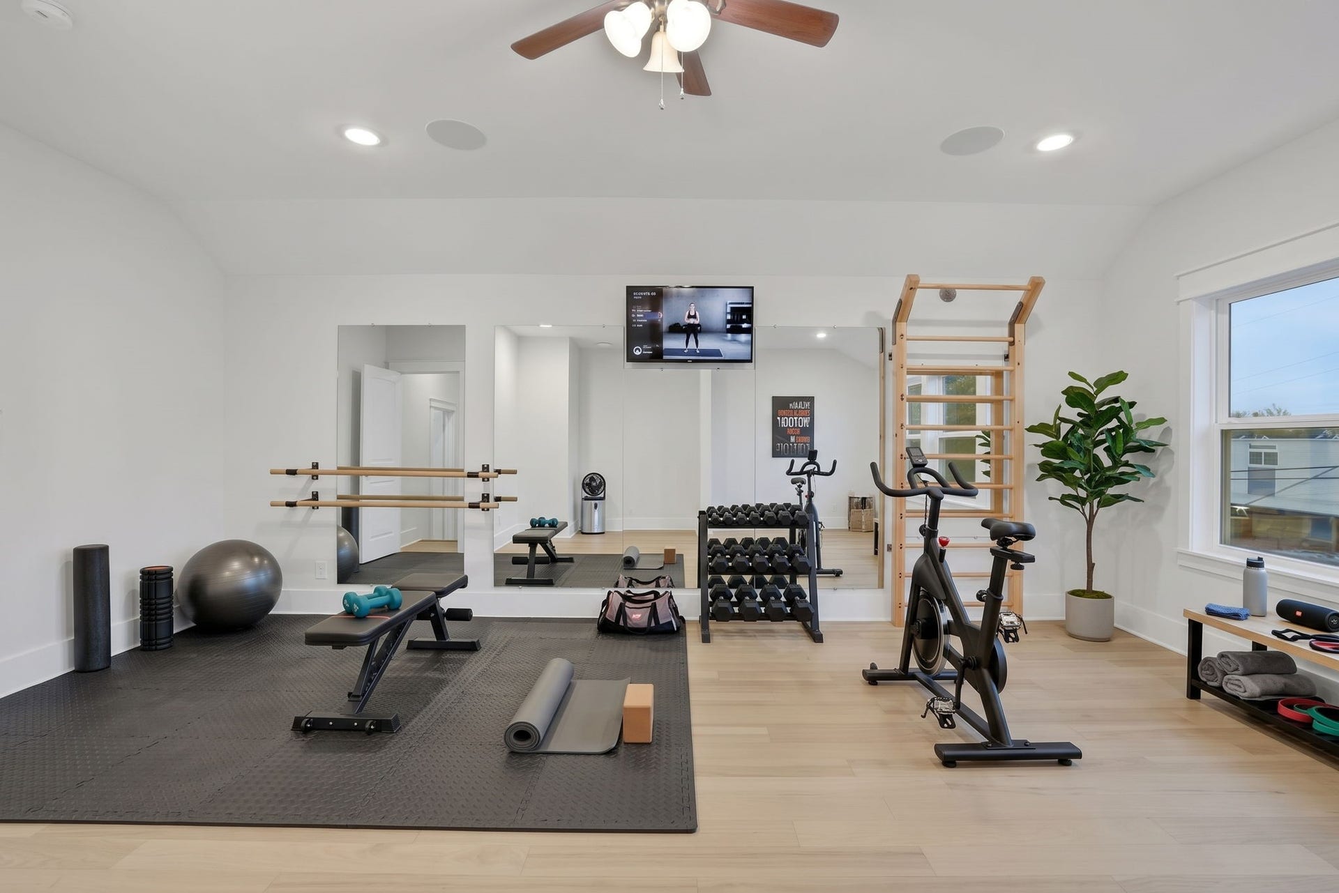8558 Ridgepoint Drive, Houston, TX 77055 A dedicated fitness setup brings the workout home.