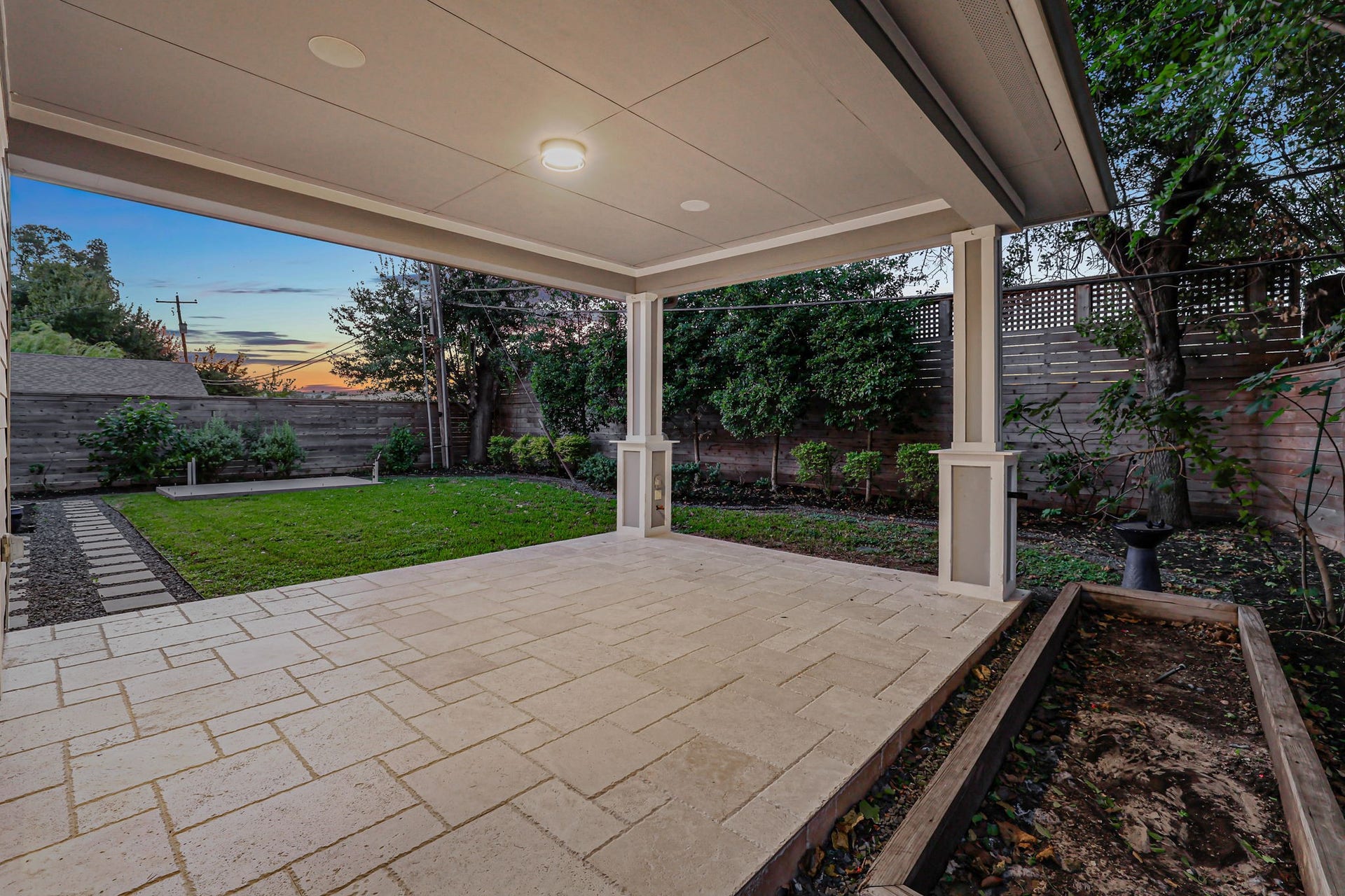 8558 Ridgepoint Drive, Houston, TX 77055 A covered patio extends the living space outdoors.