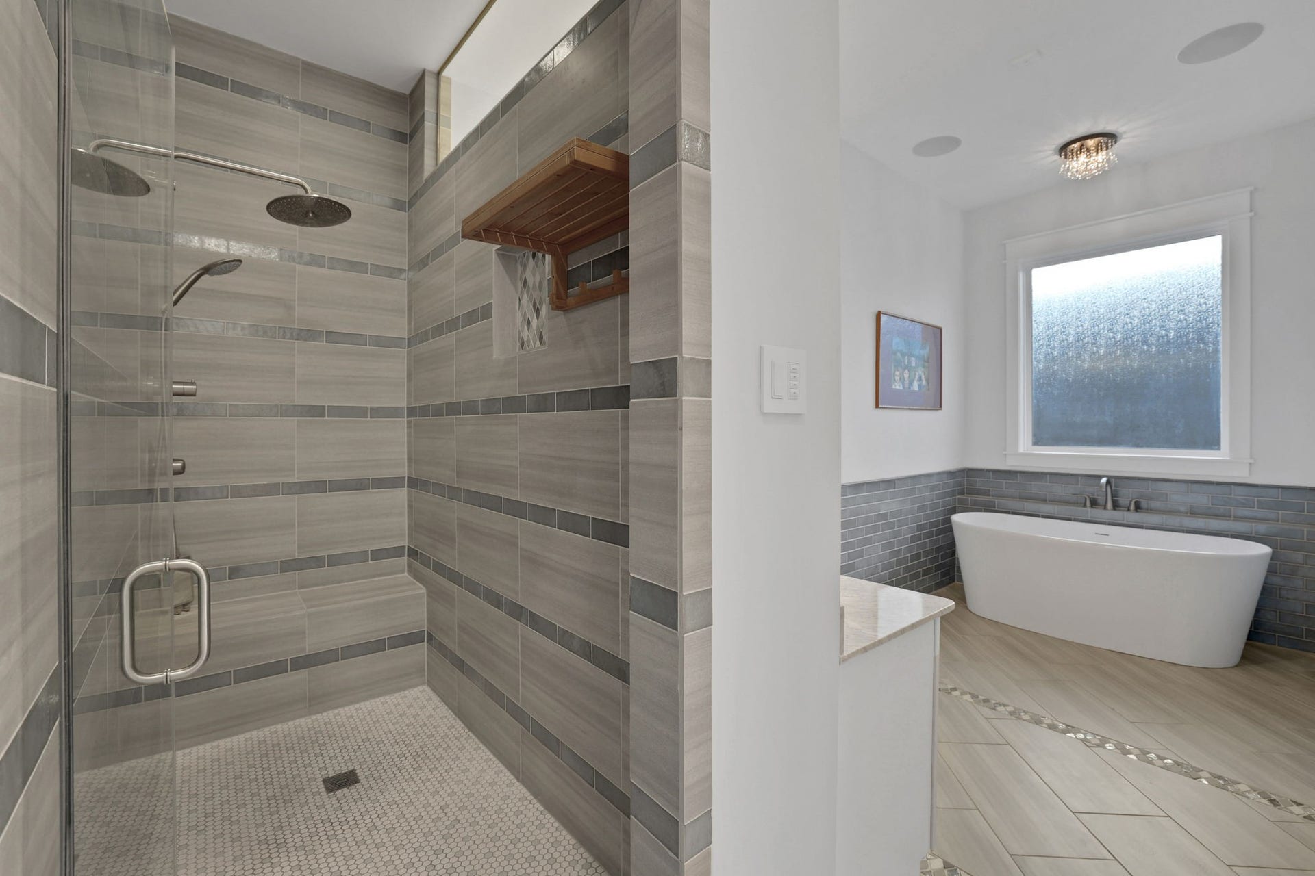 8558 Ridgepoint Drive, Houston, TX 77055 Glass shower panels keep the bath feeling open.