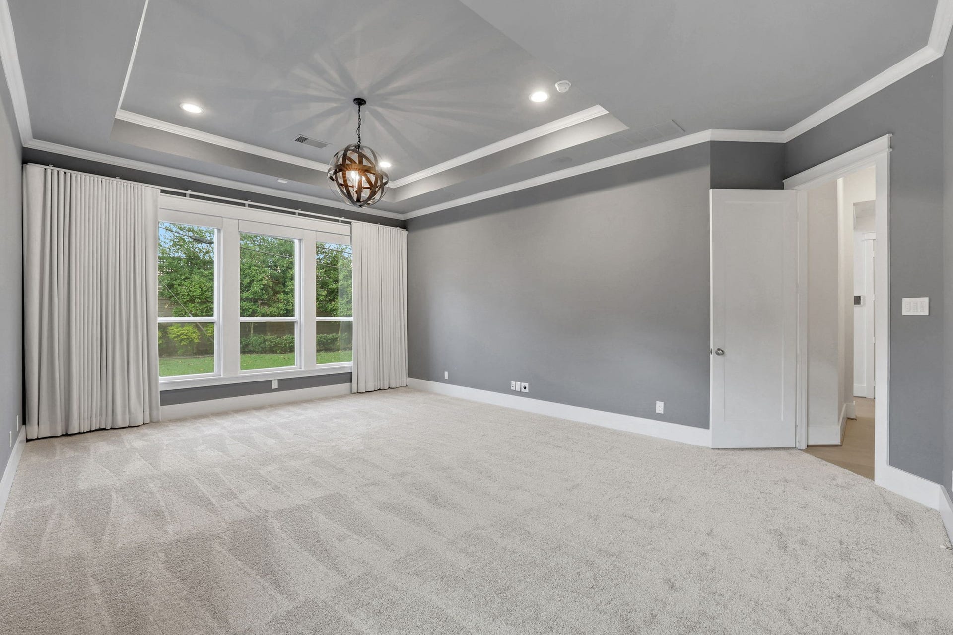 8558 Ridgepoint Drive, Houston, TX 77055 A detailed ceiling and french doors give this room presence.