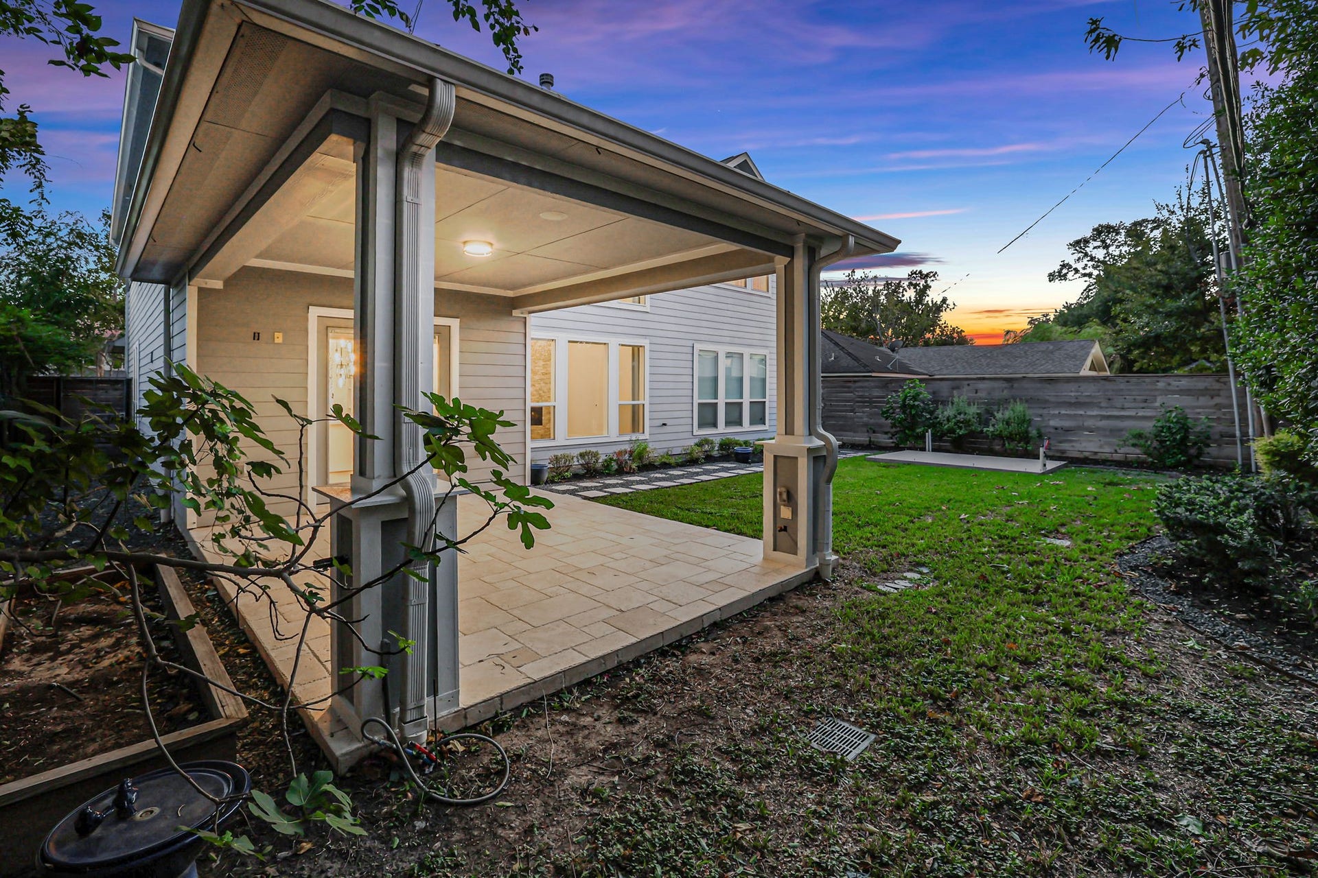 8558 Ridgepoint Drive, Houston, TX 77055 The rear elevation opens onto a lawn with room to enjoy.