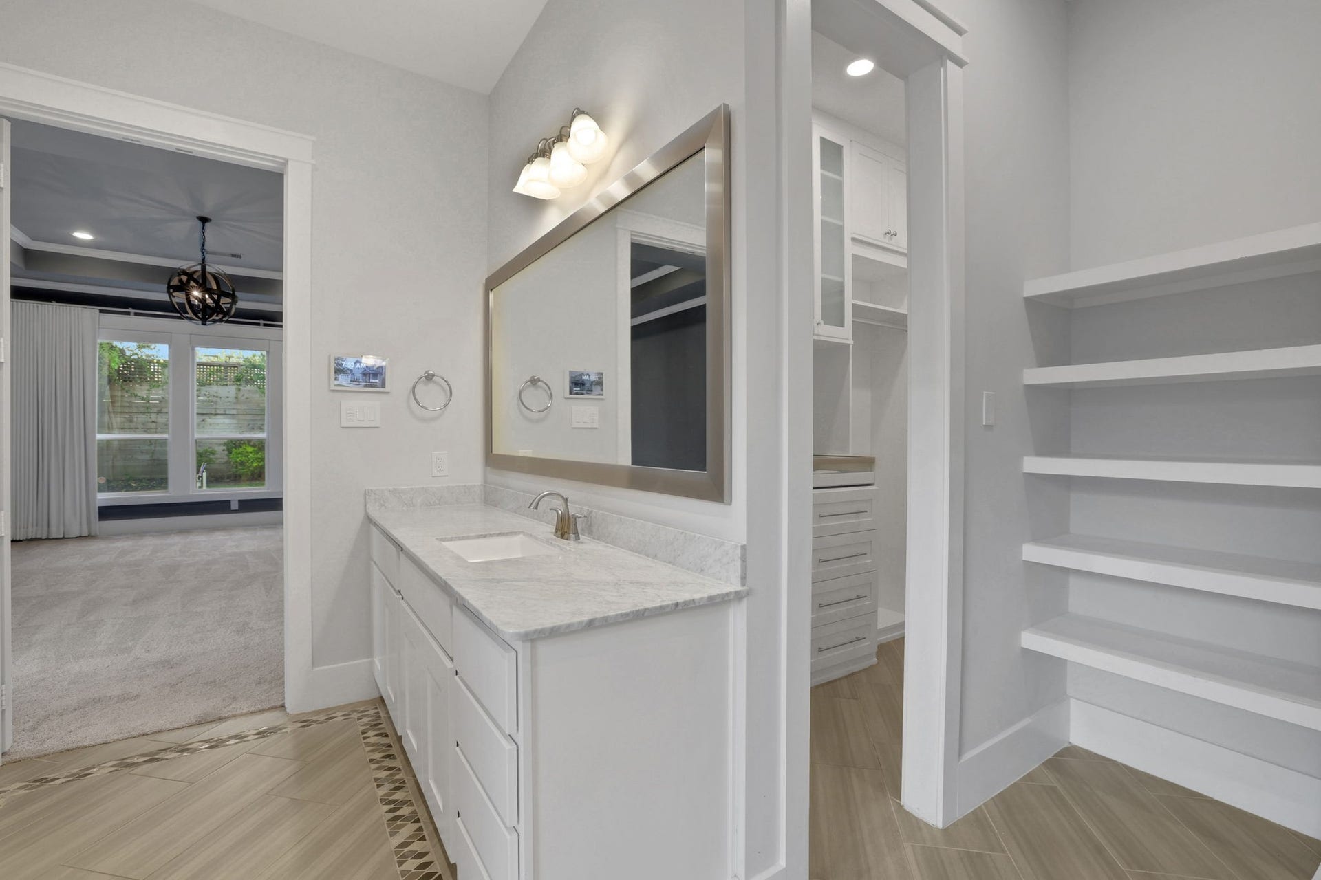 8558 Ridgepoint Drive, Houston, TX 77055 A vanity with direct access to the closet.