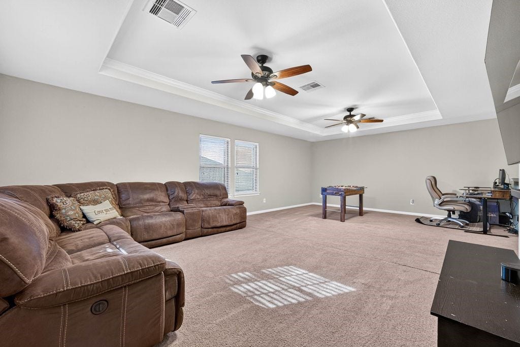 HUUUUUGE flex room upstairs leaving you with endless options: gym, movie room, homeschool area, office, game room