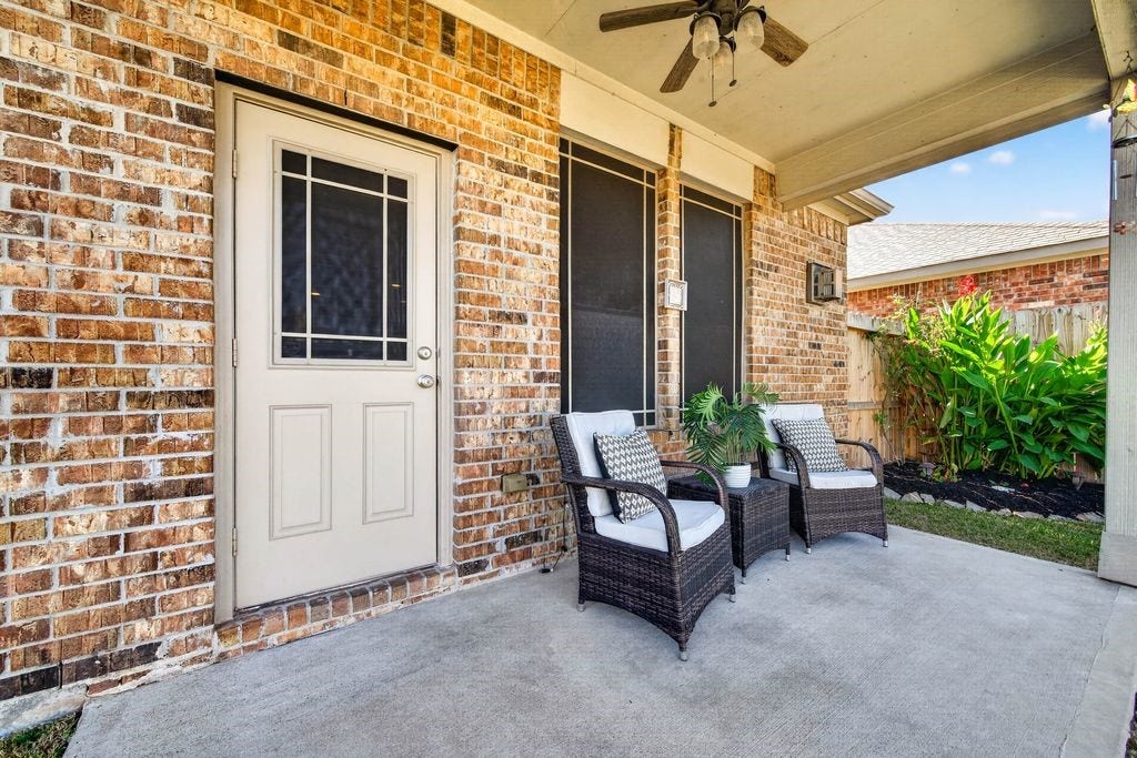 relaxing covered back porch ready for morning coffee