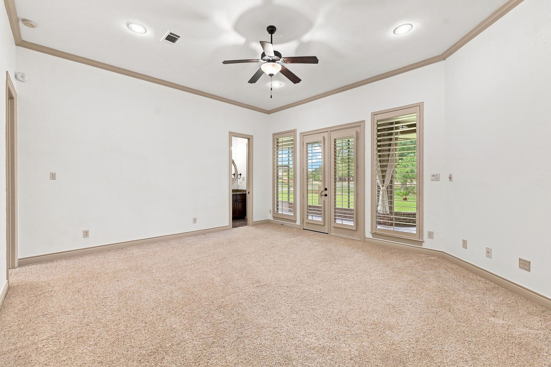 5411 Woodbury Street, Fulshear, TX 77441 The spacious Game Room offers plenty of room for a large-screen TV and comfortable furnishings, making it an ideal space for movie nights, game days, and entertaining family and friends. Direct access to the screened-in back patio extends the living space outdoors, while a conveniently located Half Bath adds functionality for guests.
