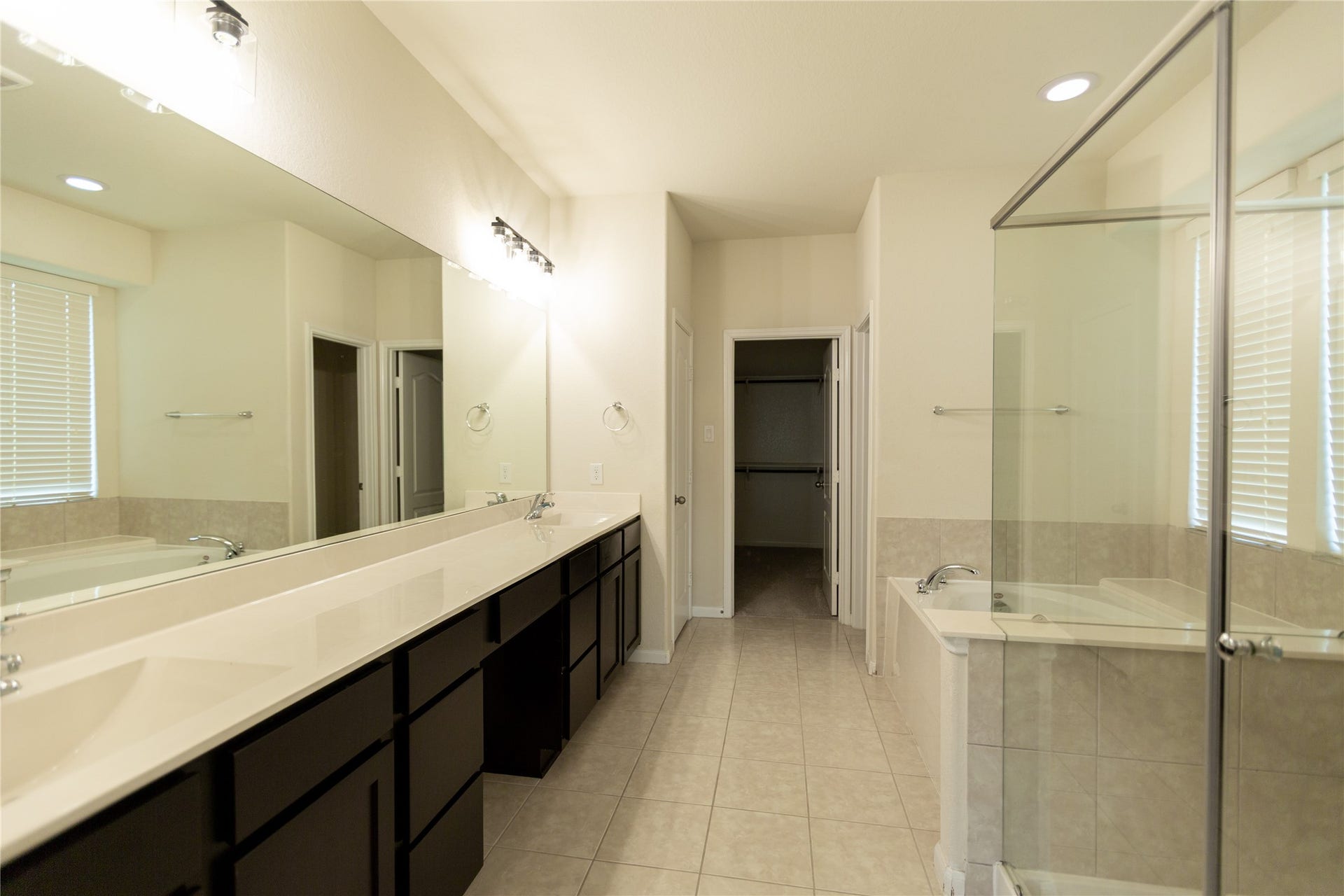 21014 Brunson Falls Drive, Richmond, TX 77407 Primary Bathroom with double sinks and extended shower space