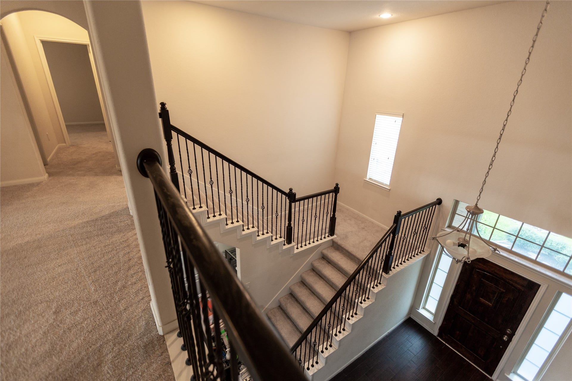 21014 Brunson Falls Drive, Richmond, TX 77407 Second floor view looking down at main entrance