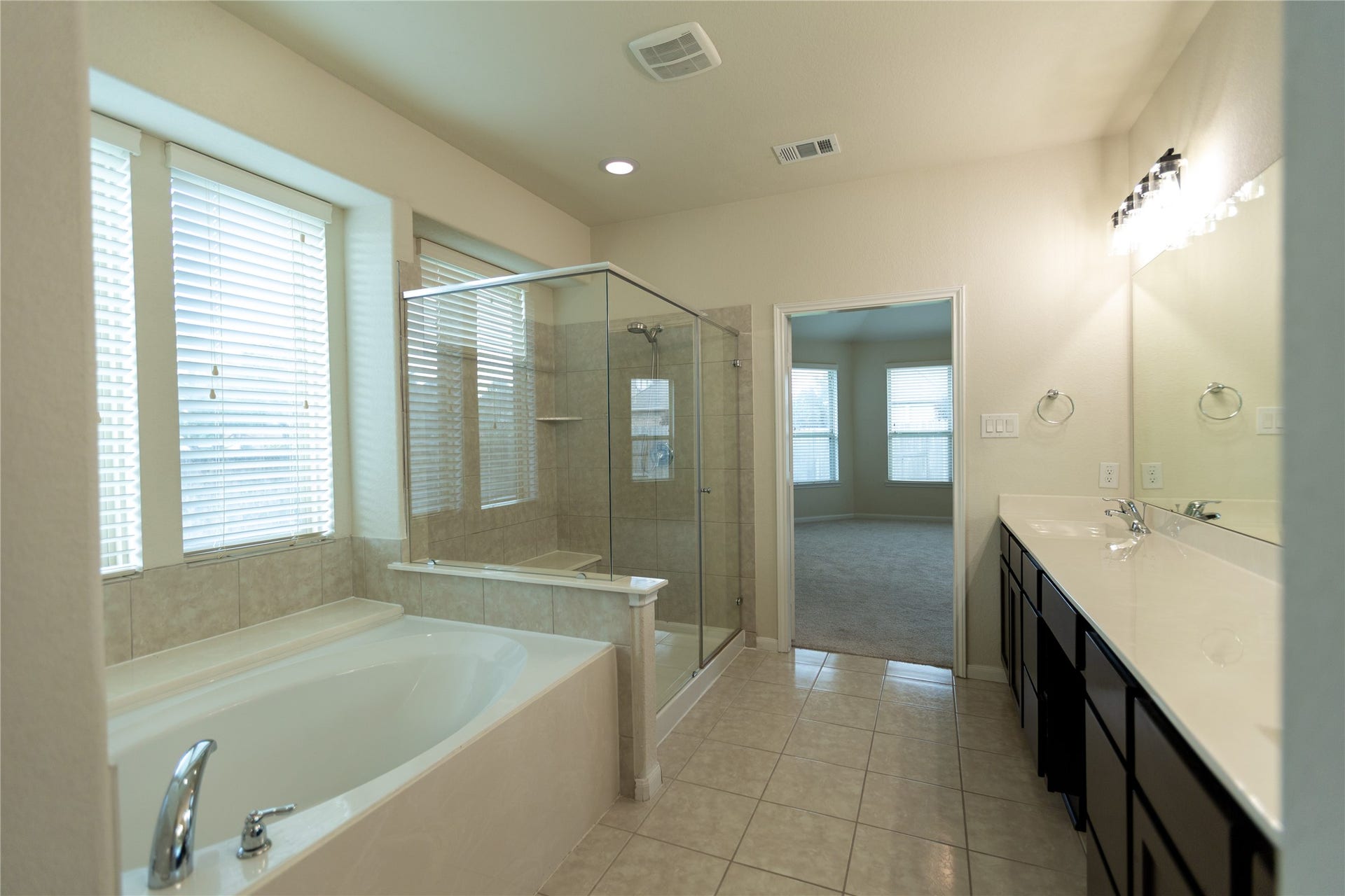 21014 Brunson Falls Drive, Richmond, TX 77407 Primary bathroom
