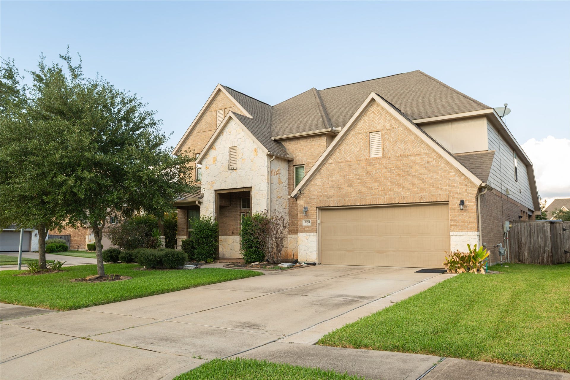 21014 Brunson Falls Drive, Richmond, TX 77407 Front view