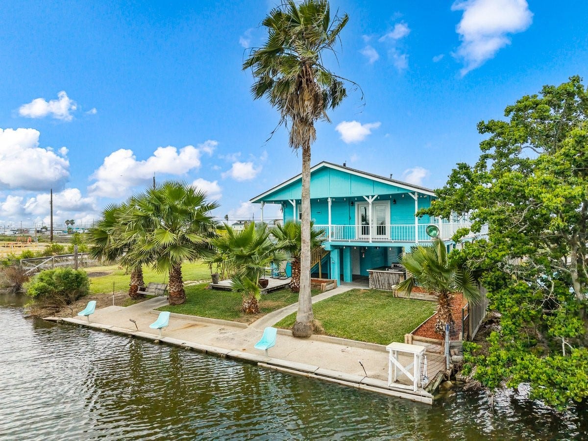 7210 Beau Terre Street, Hitchcock, TX 77563 Canal front home close to Galveston