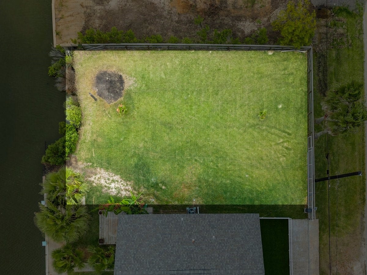 7210 Beau Terre Street, Hitchcock, TX 77563 build on the extra lot or it could be sold off separately