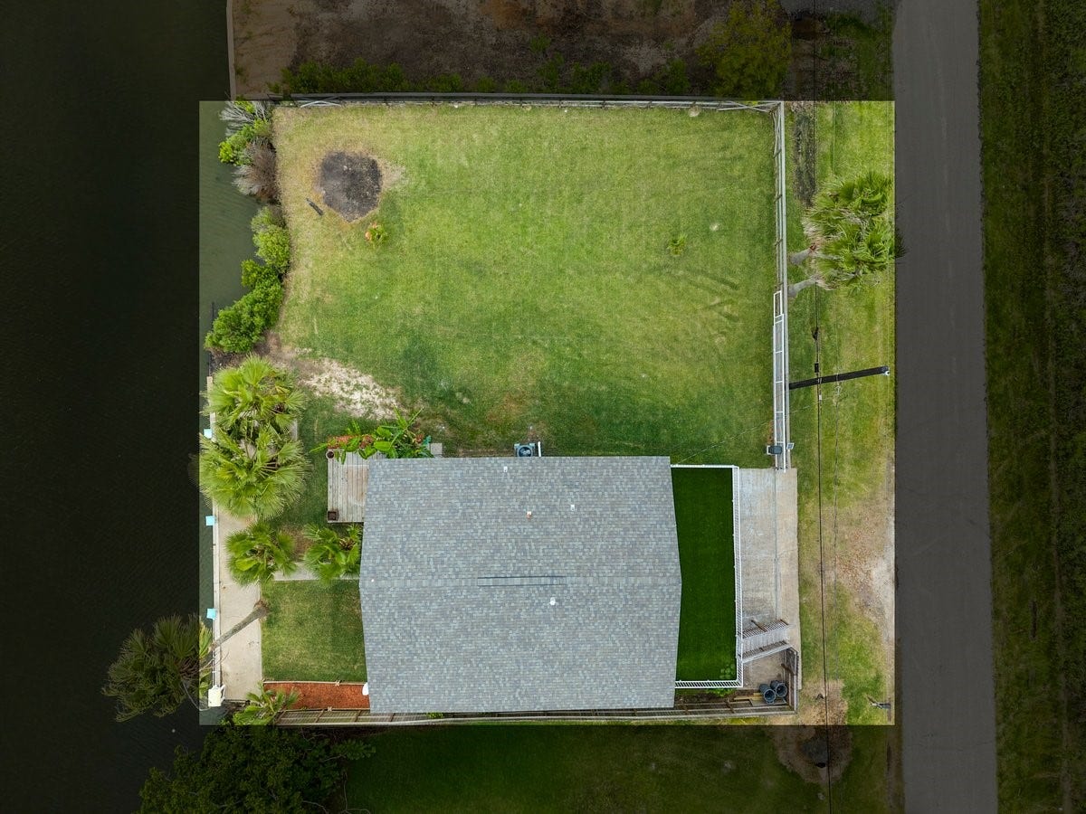 7210 Beau Terre Street, Hitchcock, TX 77563 both lots are Fully fenced in