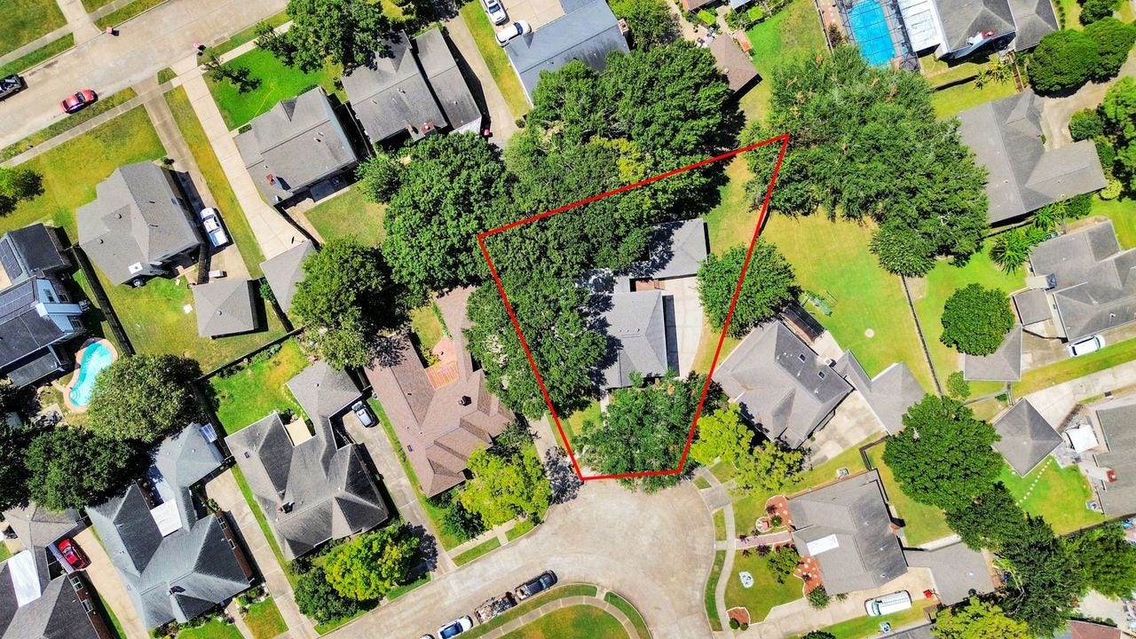 15047 Tramore Drive, Houston, TX 77083 From above, the view showcases the large lot.