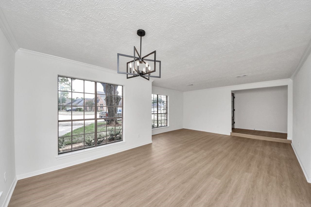 15047 Tramore Drive, Houston, TX 77083 The windows steal the show here. They bring the outdoors into the room and give this space an open, inviting feel.