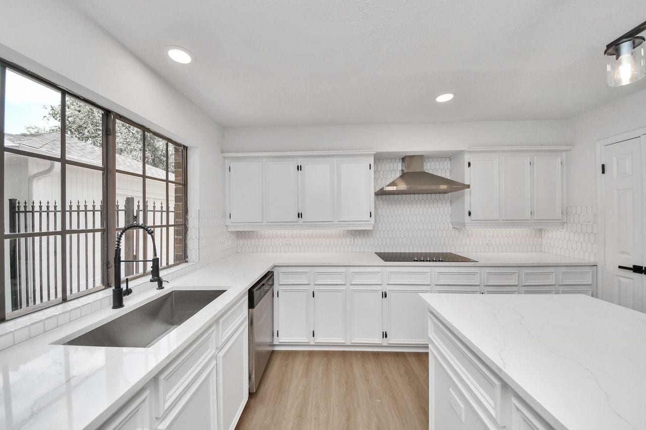 15047 Tramore Drive, Houston, TX 77083 There is plenty of room to prep, gather, and entertain, making this a true centerpiece of the home.