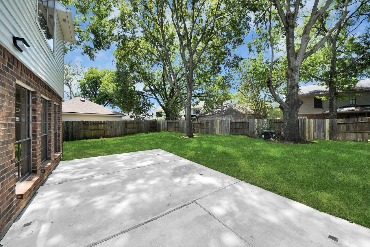 15047 Tramore Drive, Houston, TX 77083 With the extended patio space, outdoor living becomes effortless, giving you plenty of room for grilling, entertaining, relaxing, or enjoying morning coffee.